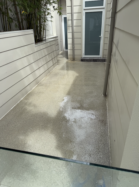 Before and after concrete pressure cleaning by Mega Clean