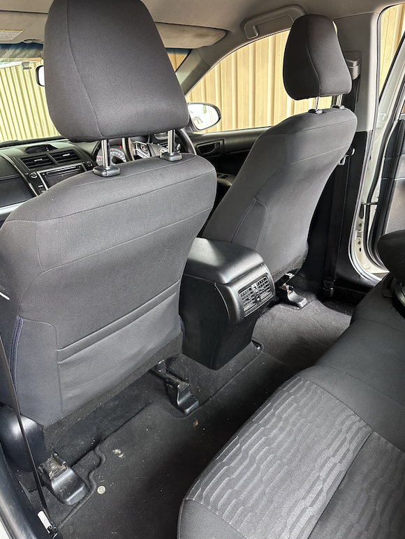 Before and after car upholstery cleaning by Mega Clean