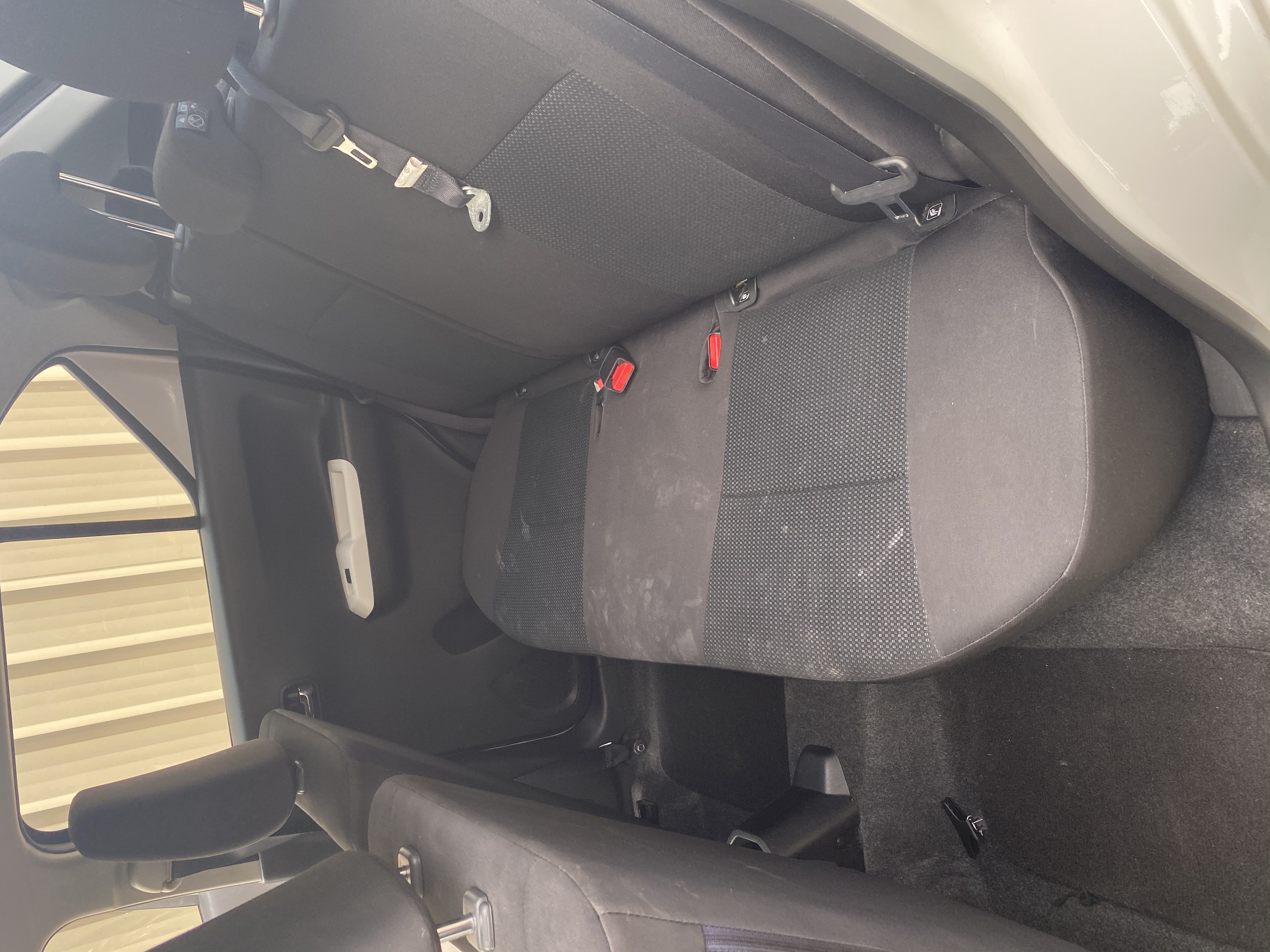 Mega Clean technician deep cleaning a vehicle seat
