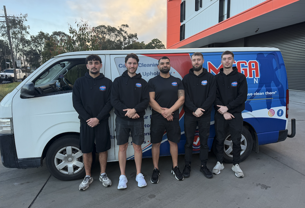 Mega Clean franchise partner technician operating commercial cleaning equipment