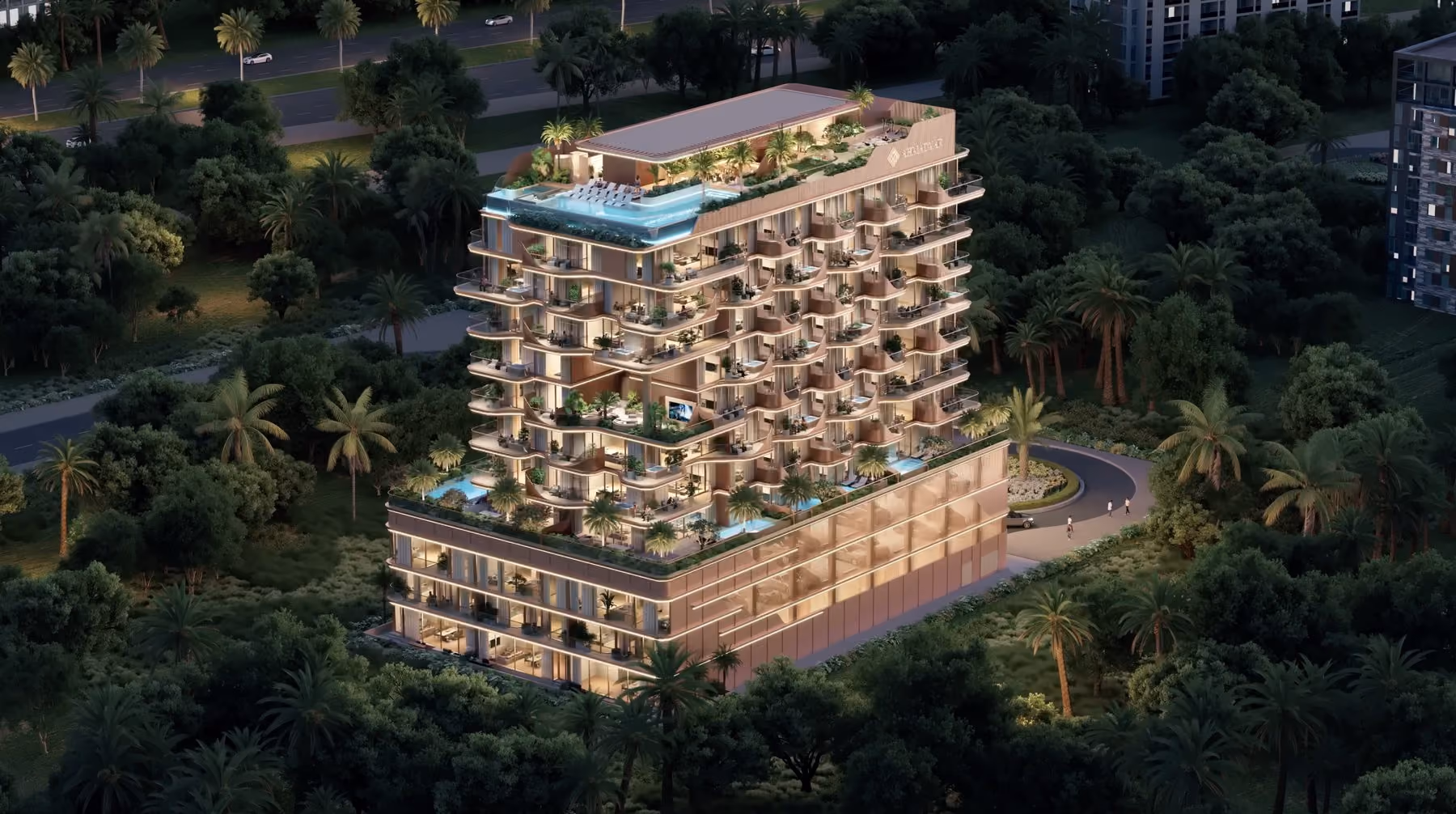 Modern multi-story building with balconies, rooftop pool, and surrounded by trees and greenery at dusk.
