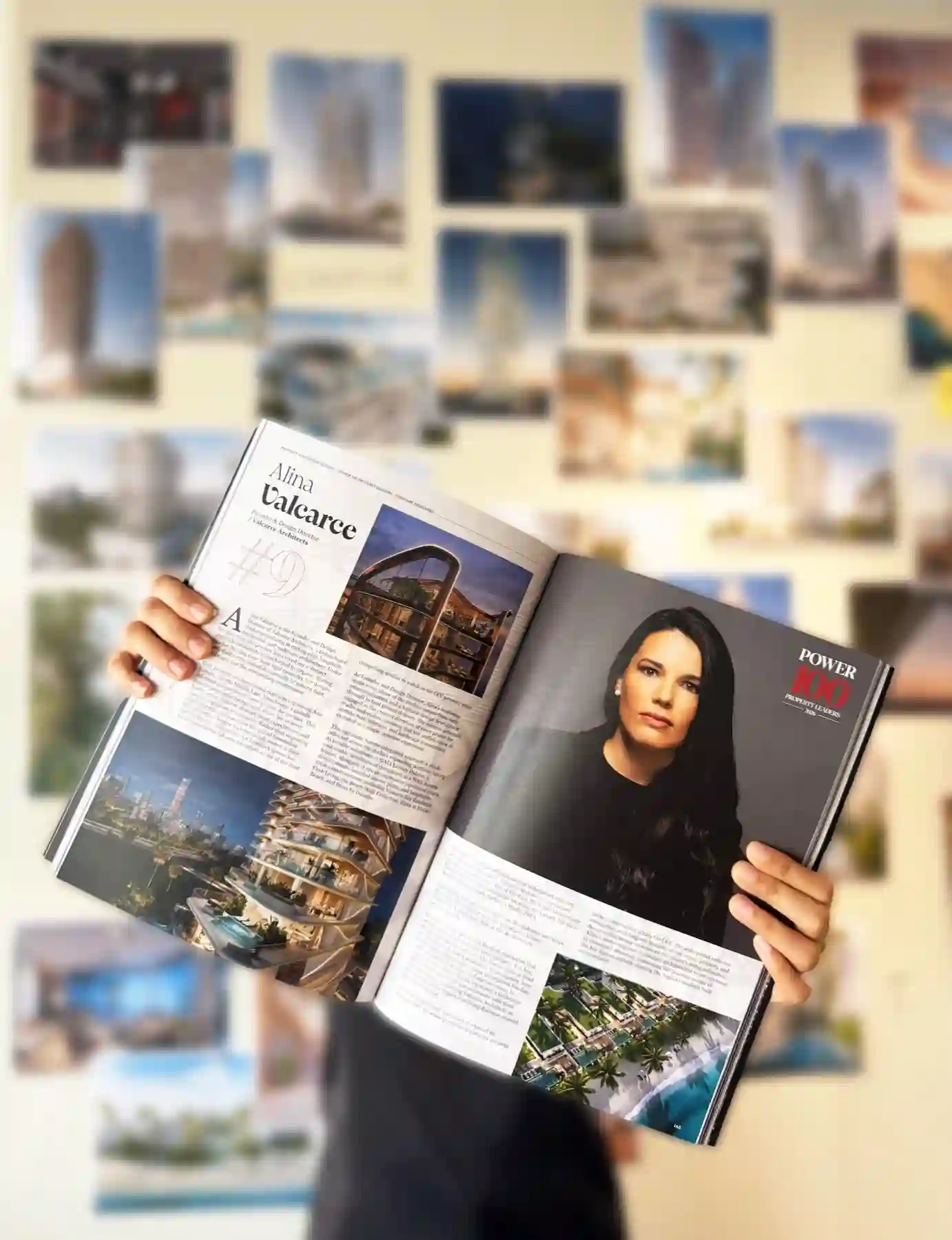 Person holding open magazine showing article on Alina Valcarce with her portrait and architecture images.