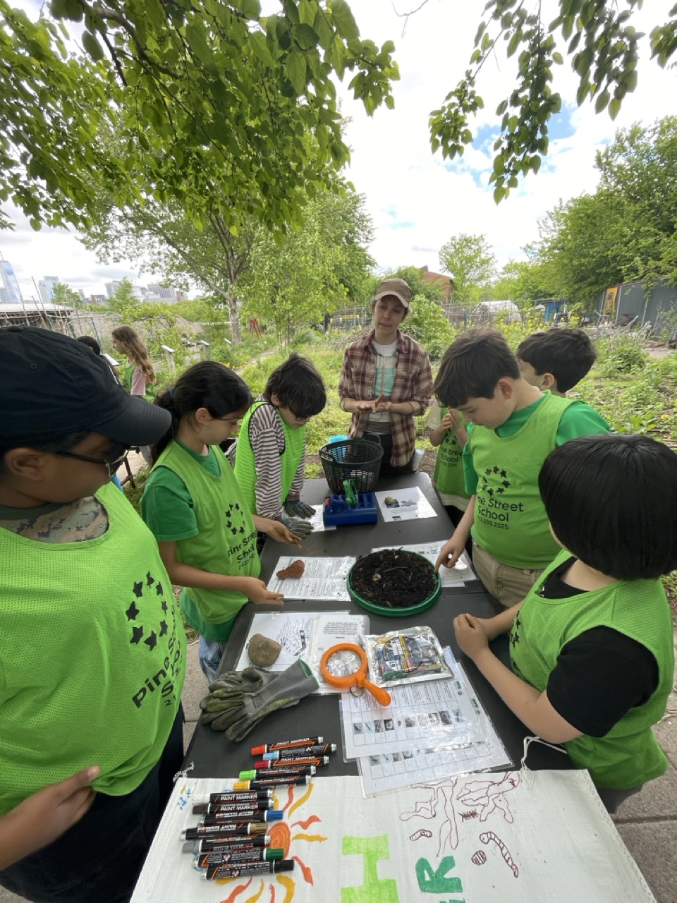 Students listening to their guide in the outdoors
