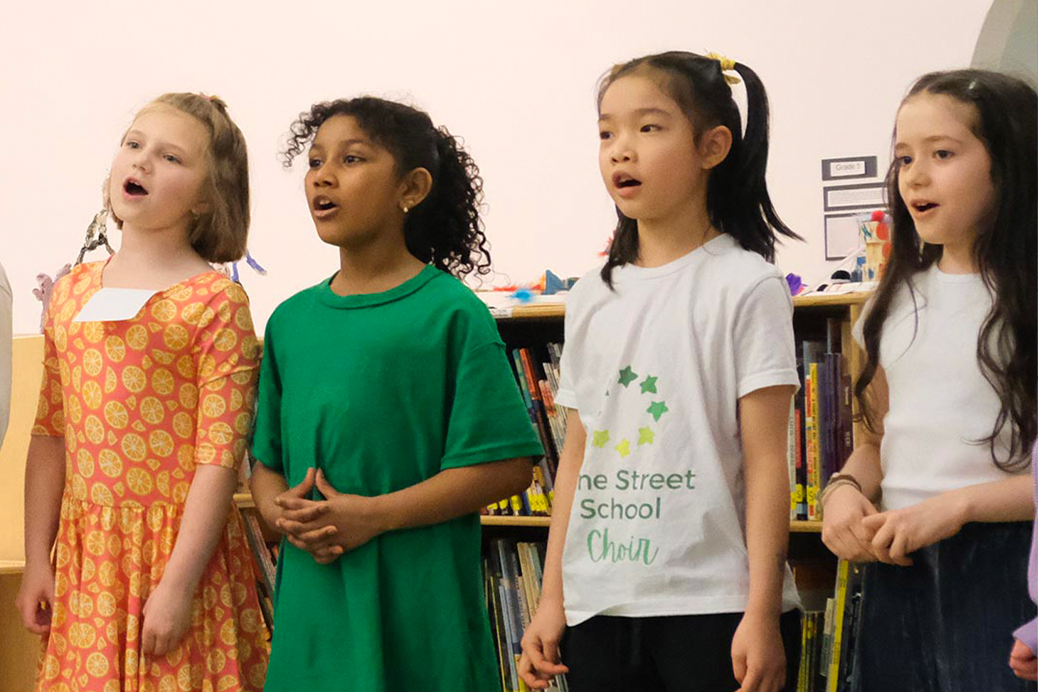Pine Street School's choir students sing during practice