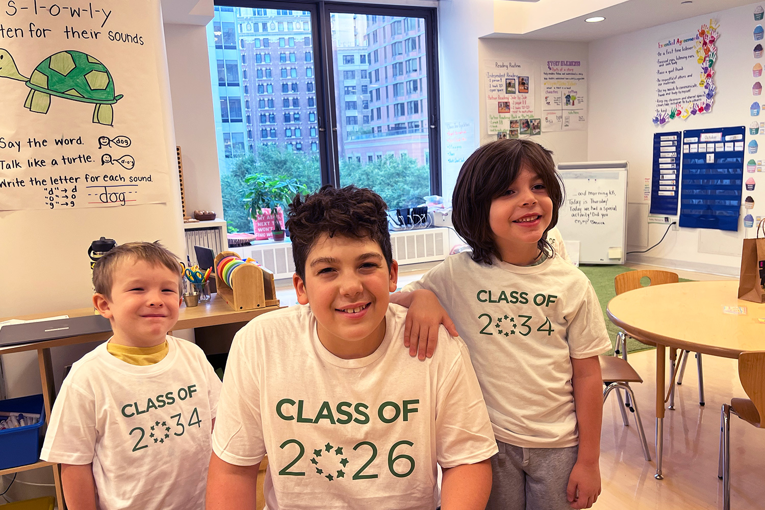 Students smiling during the 8th-grade-Kindergarten Buddy program