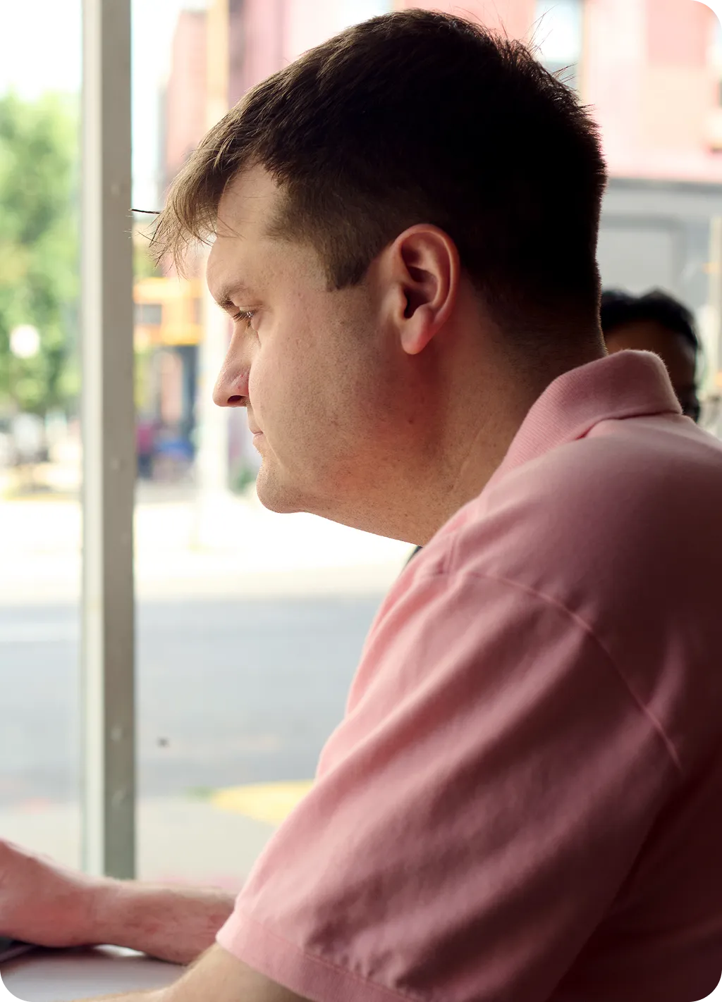 Portrait of David Rodeck working in an office setting