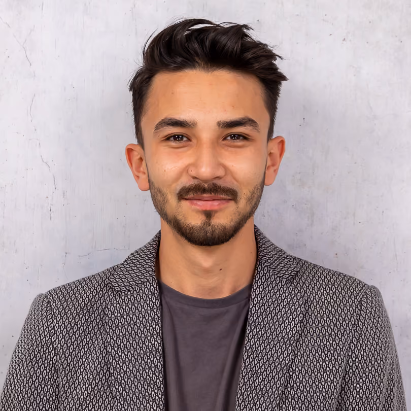 Portrait von Ali Qurbani, Modeberatung Herren bei GARHAMMER