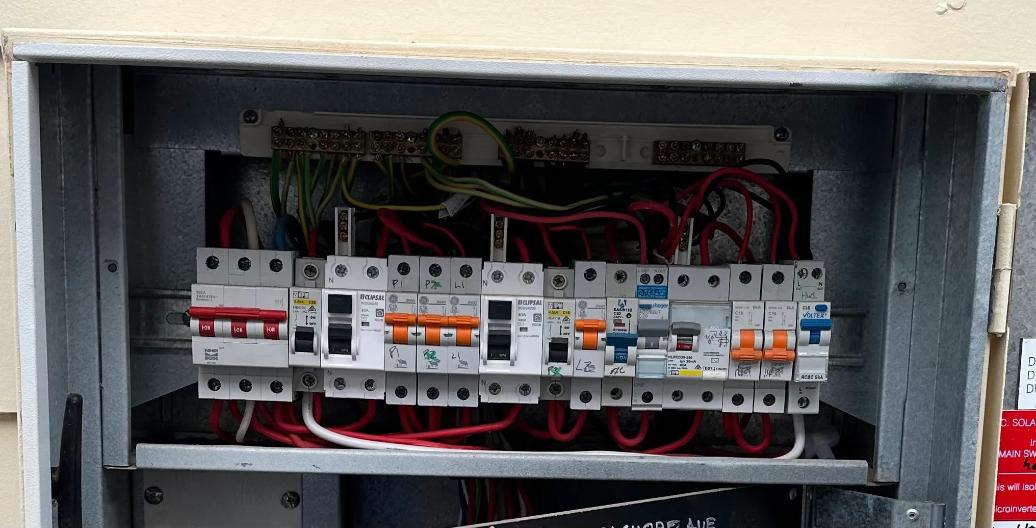 A completed BBH electrical switchboard installation with clearly labelled protective devices and organised cabling.