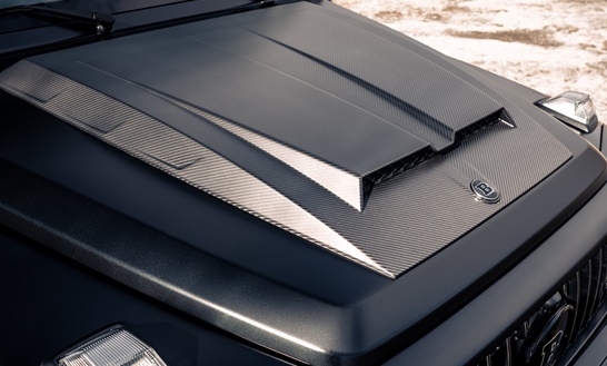 Brabus carbon fiber hood installed on a Mercedes-Benz