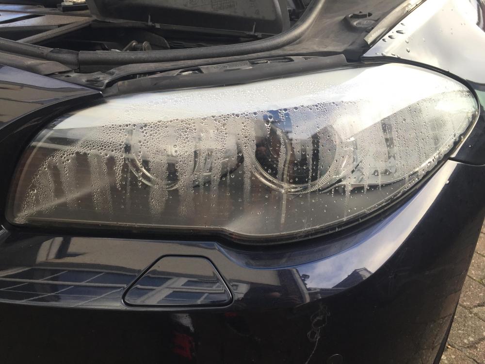 Headlight opened for cleaning and resealing to fix condensation