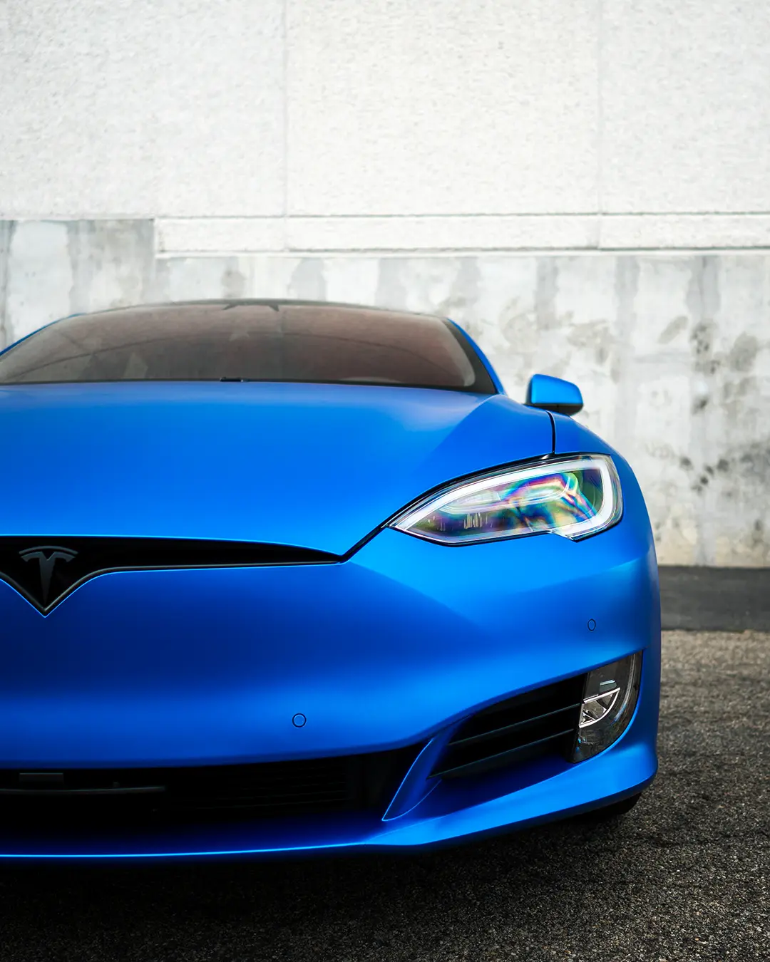 Paint protection film applied to a car front end