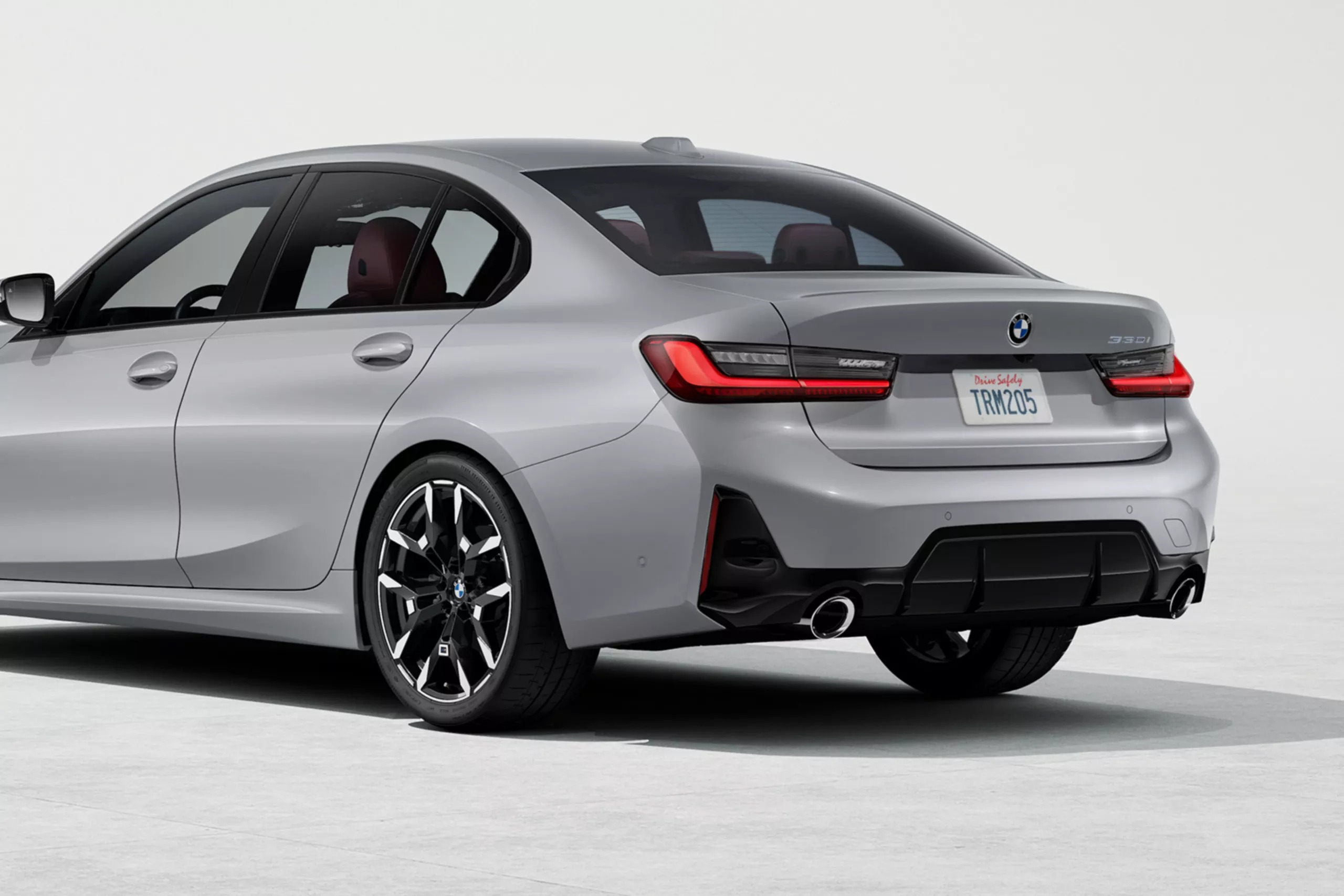 silver bmw 3 rear angle