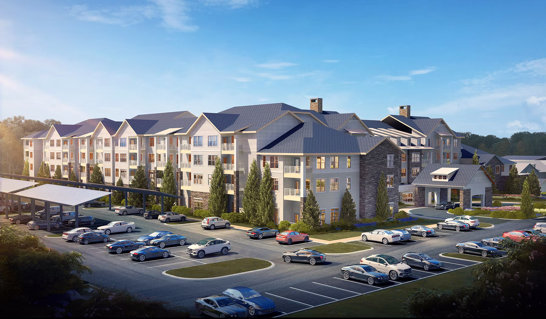 Modern multi-story residential building with balconies and a parking lot filled with cars under a clear sky.