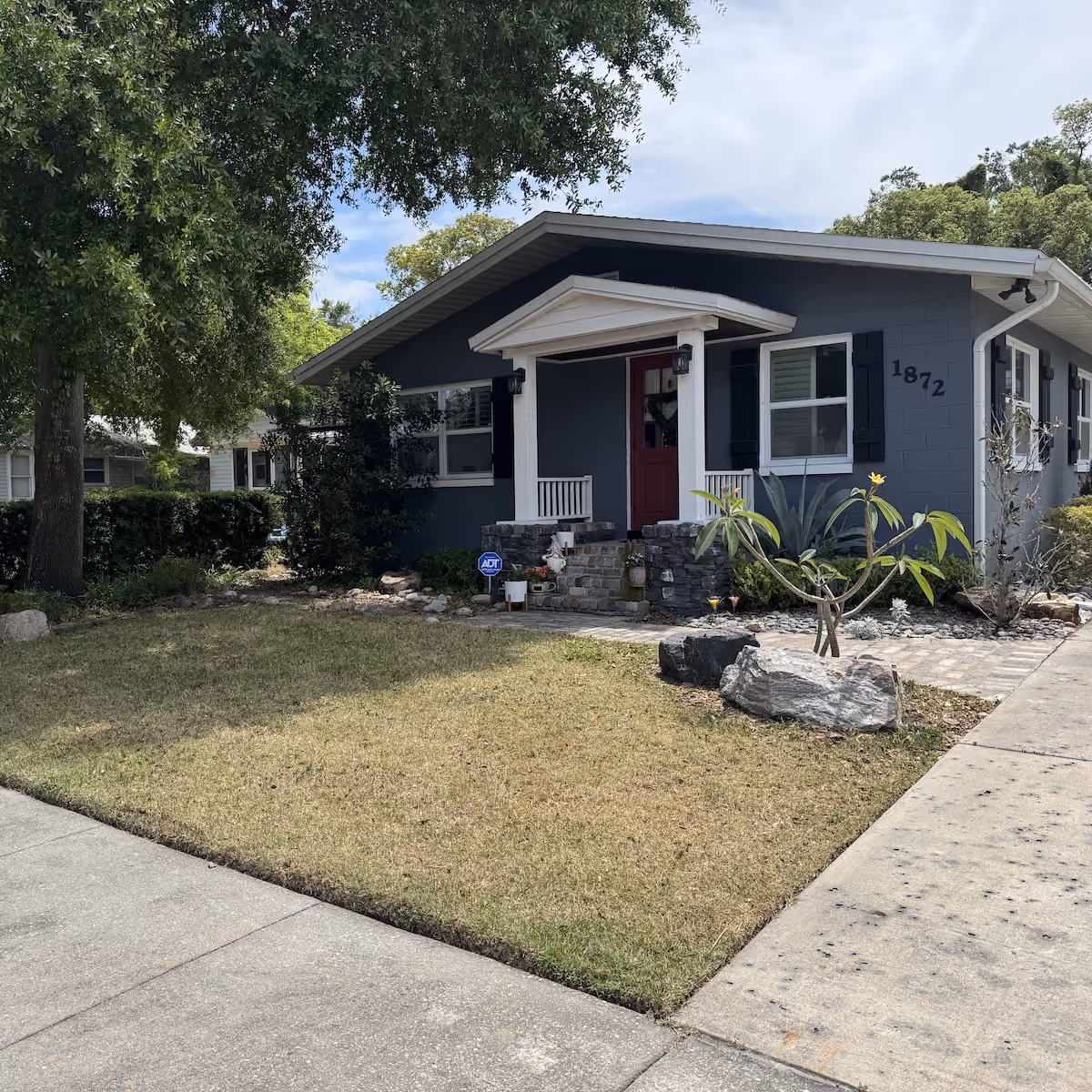 lawn mowing service near me with clean striped grass finish