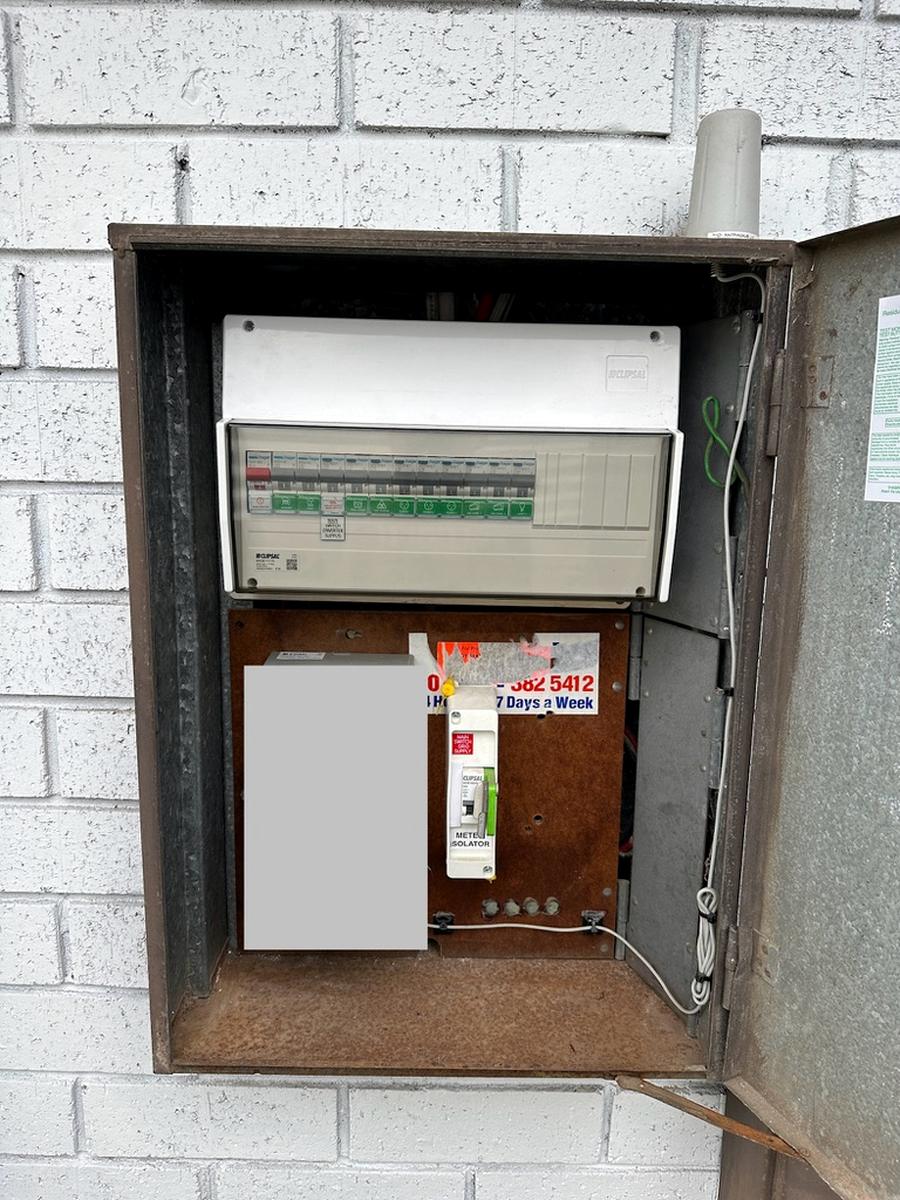 Upgraded switchboard with clearly labelled circuits and safety switches.