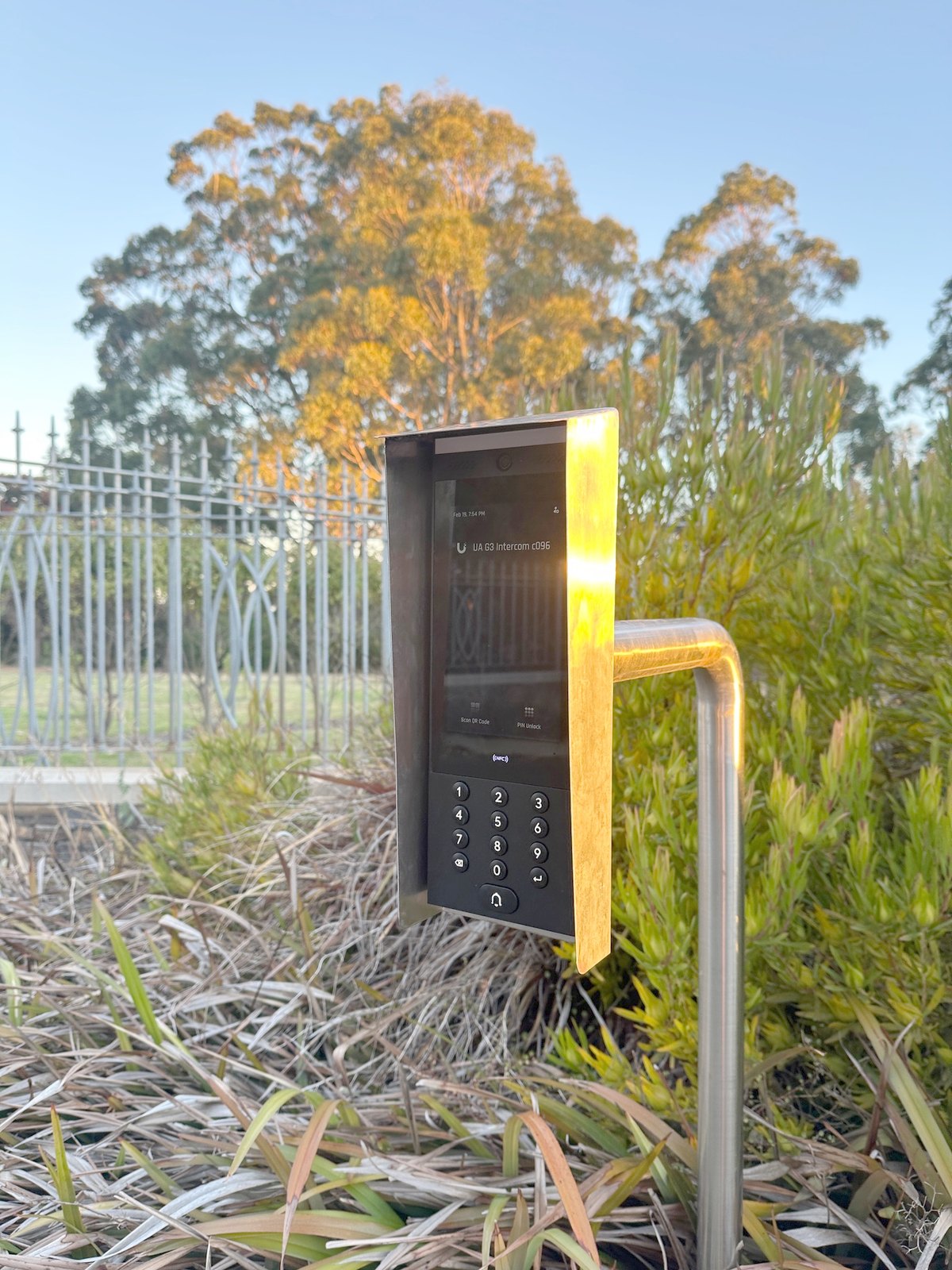 A gate intercom installed at the entrance to a property.