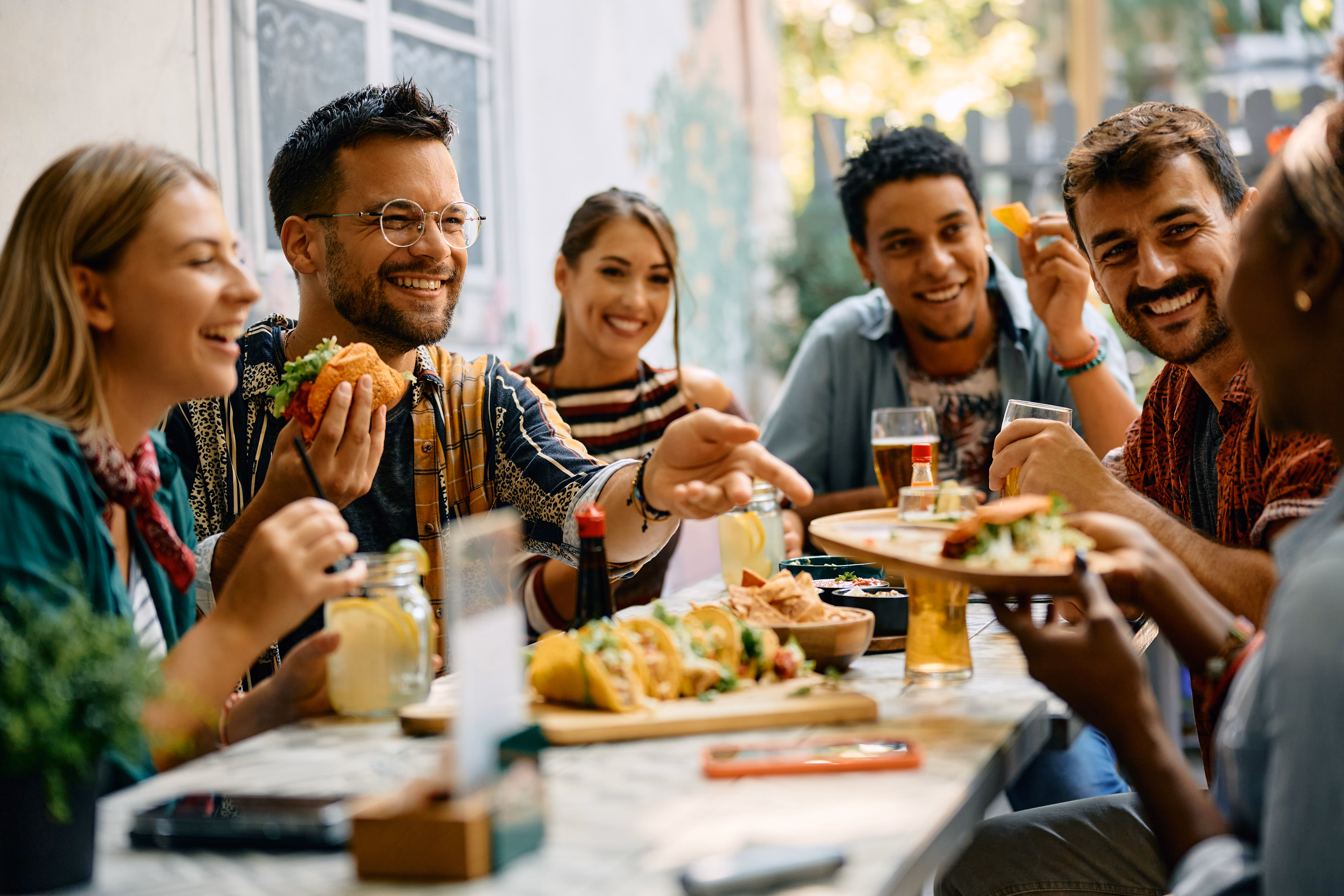 Friends at a restaurant stock image