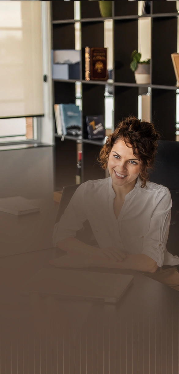Advisor smiling during a client meeting in a modern office
