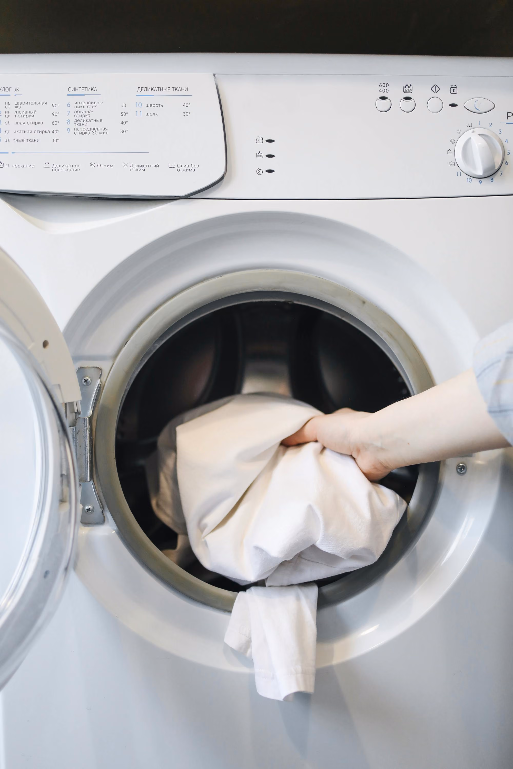 Person loading washer stock image