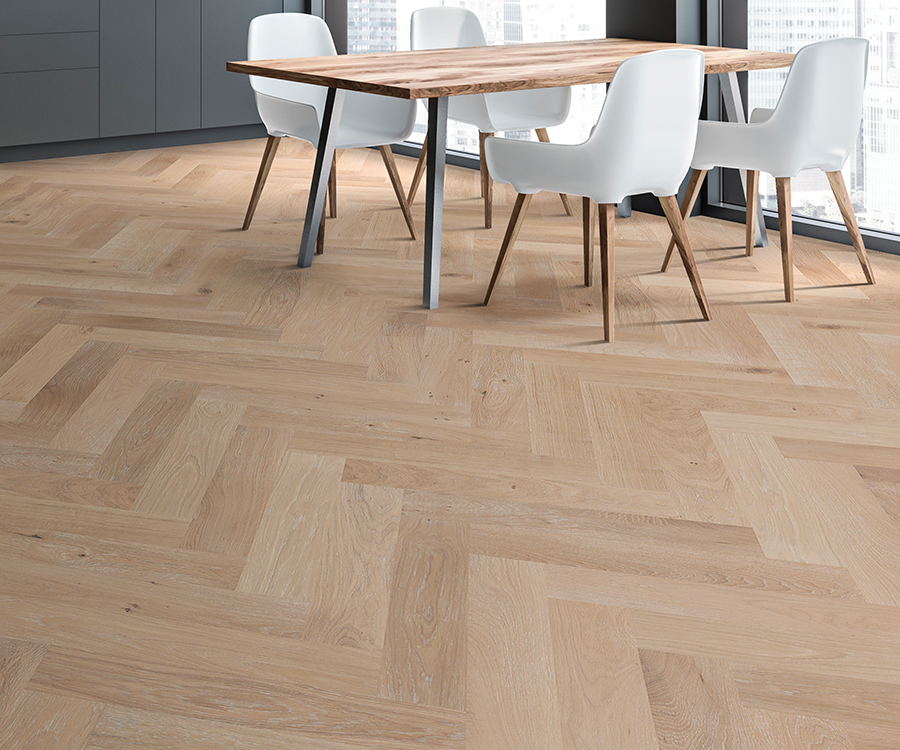 Valaire Champagne Parquet installed herringbone room scene.