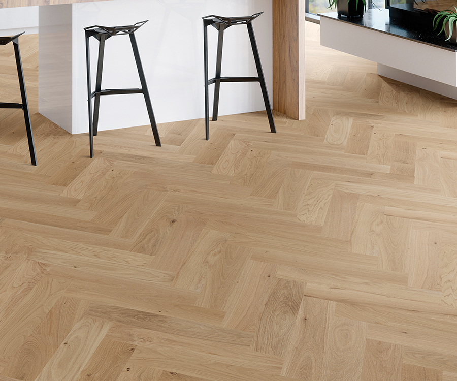 Valaire Nouvelle Parquet installed herringbone room scene.