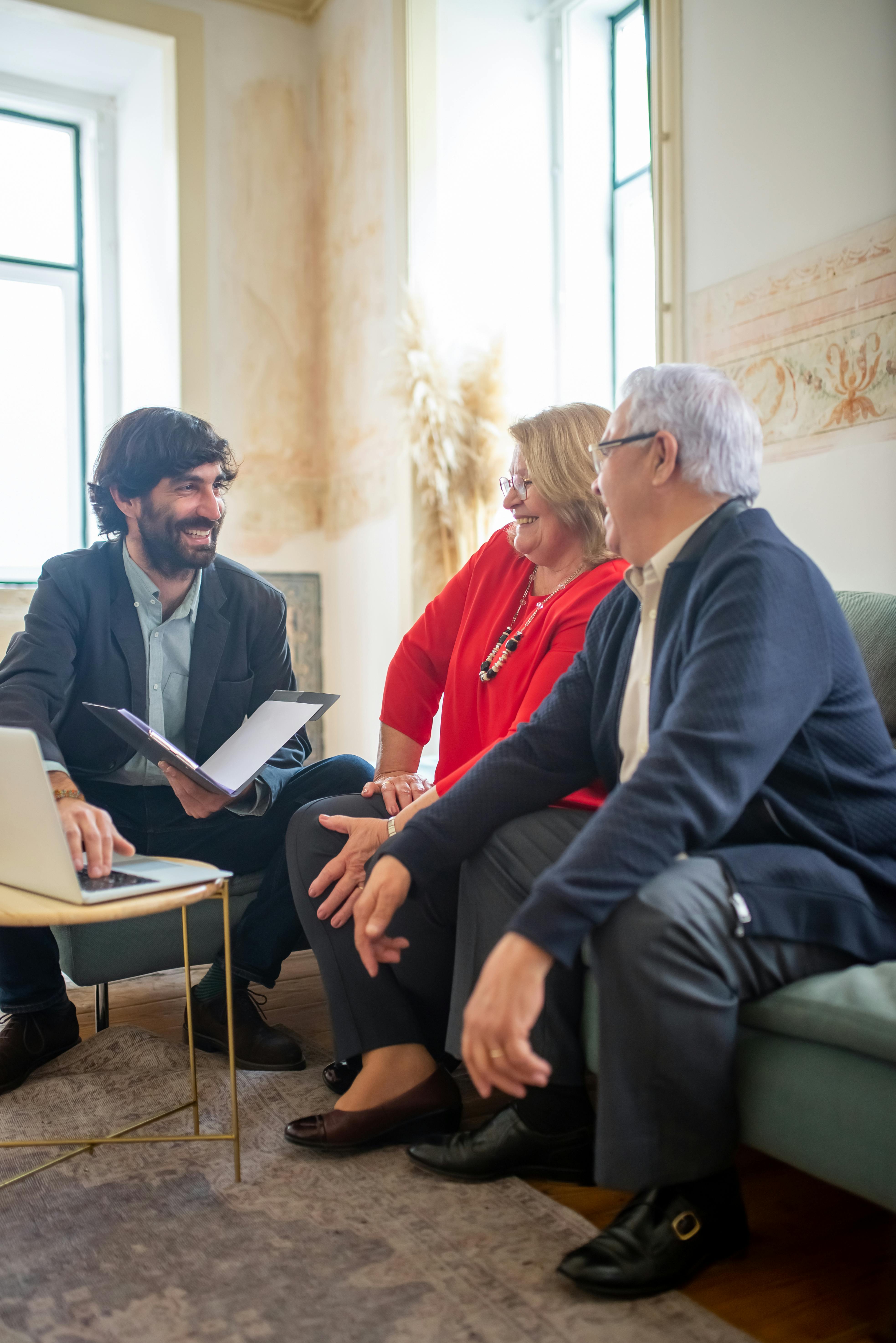 An insurance broker discussing coverages with a couple