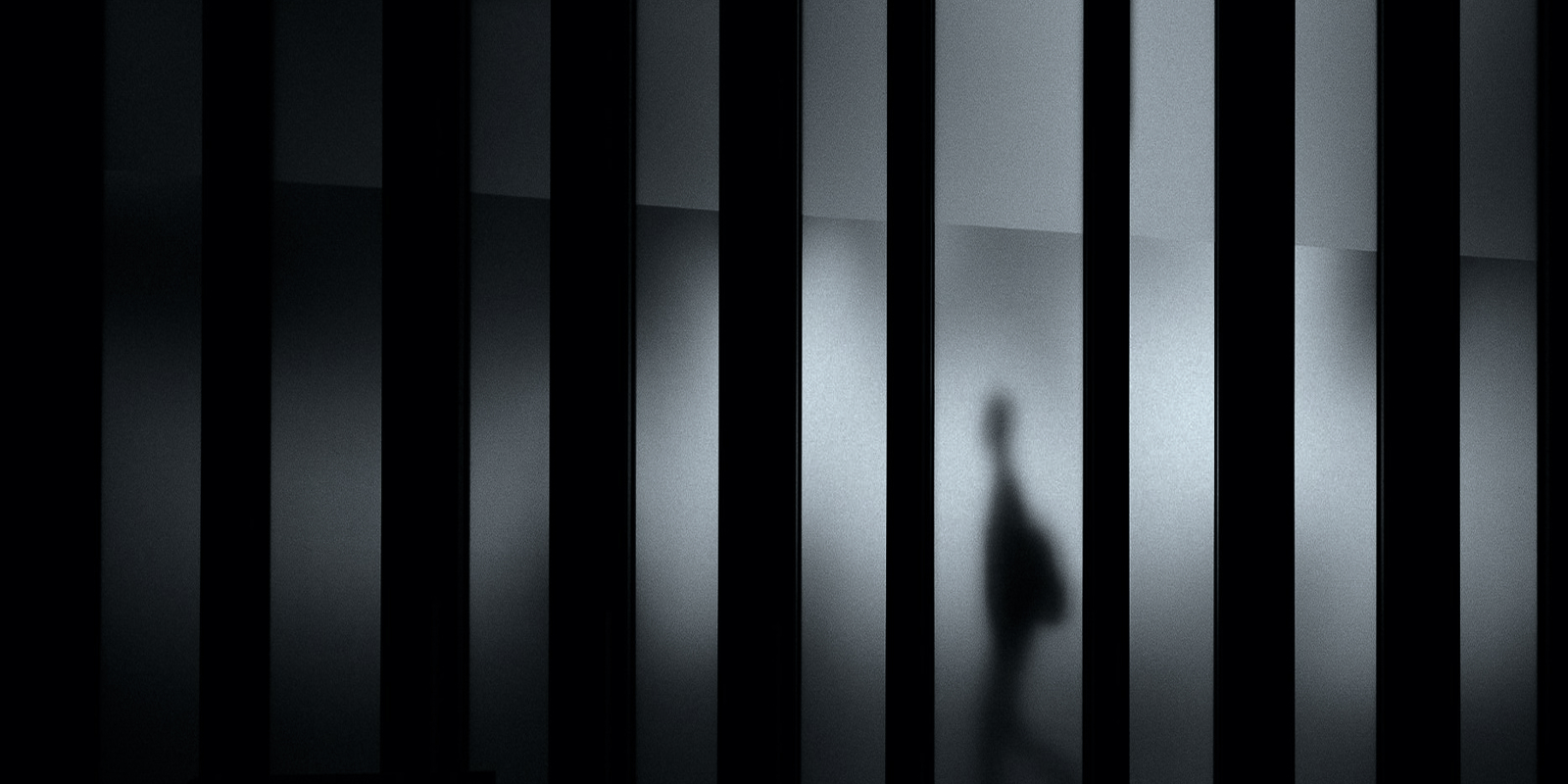 Architectural columns with dramatic shadow and light contrasts