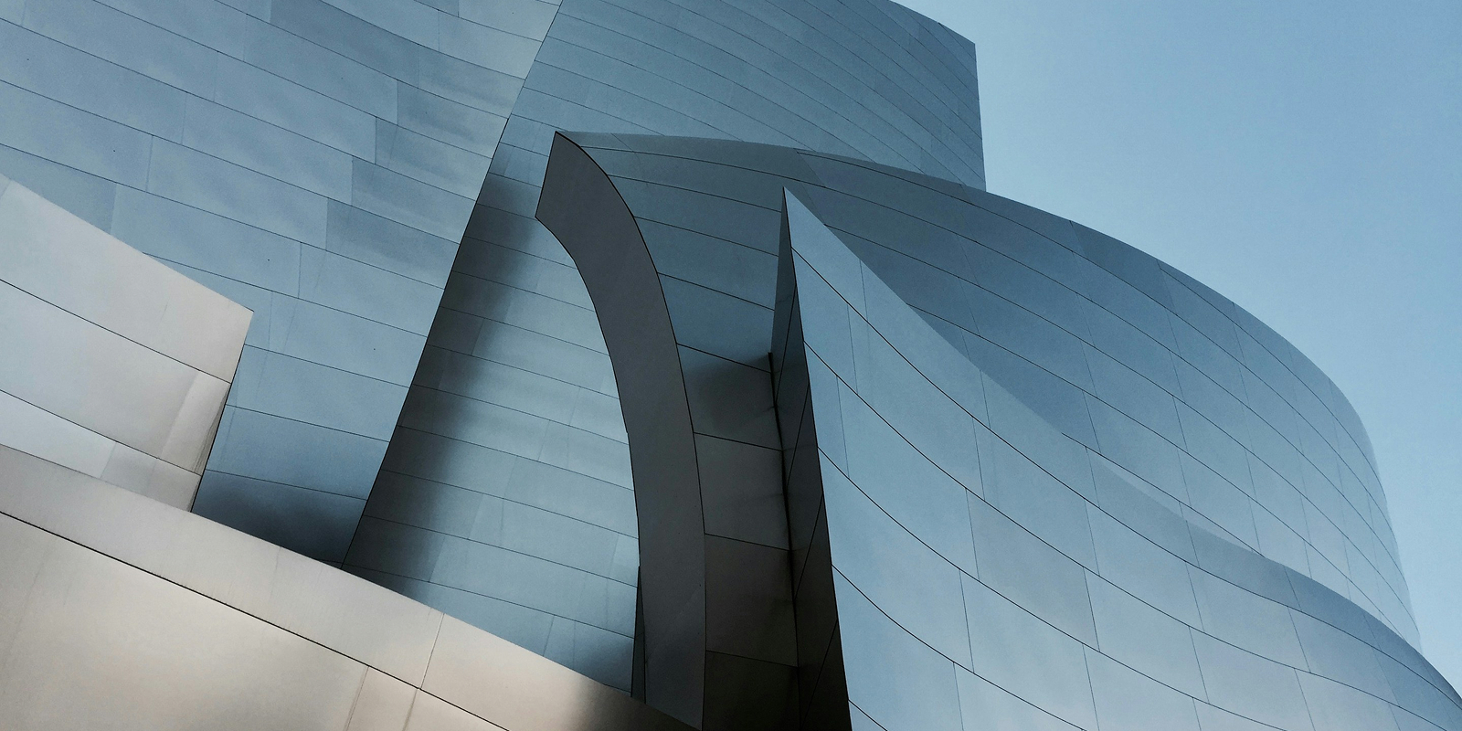 Curved abstract facade of a modern architectural building