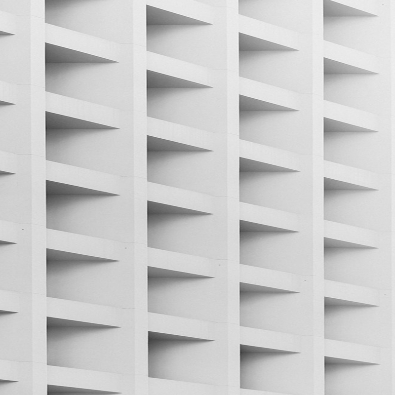 Close-up detail of a modern building facade with geometric patterning