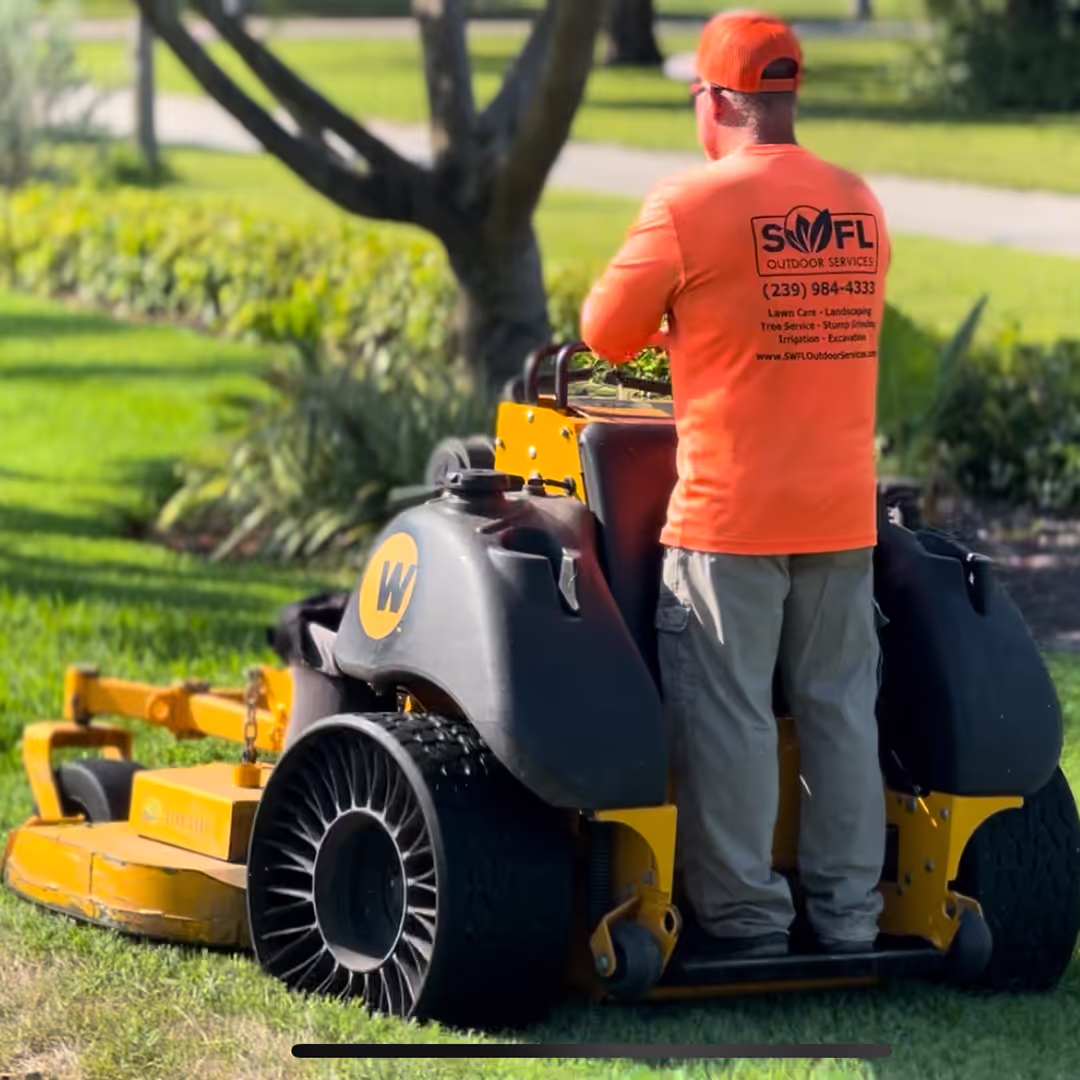 Lawn maintenance crew servicing HOA community