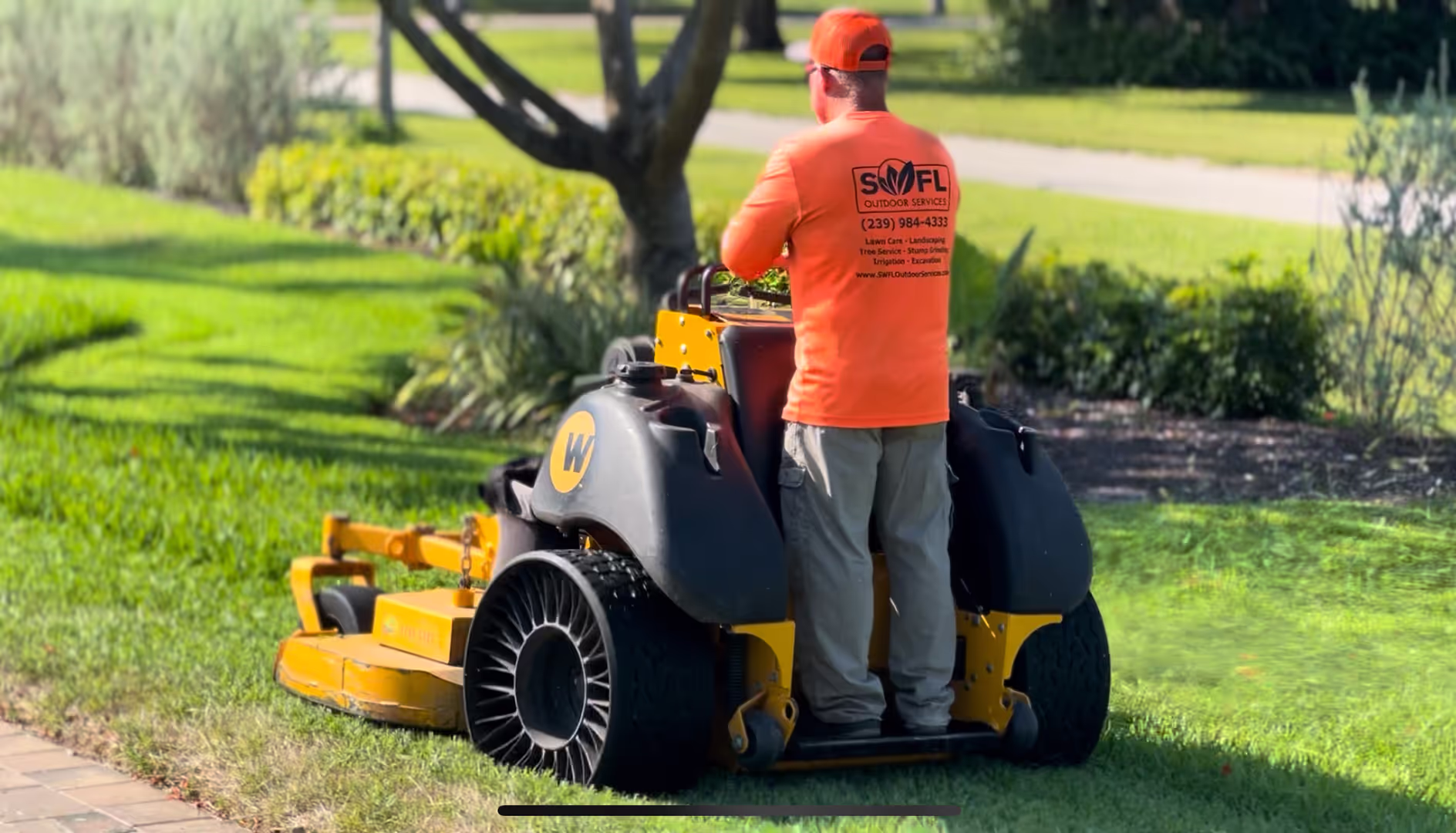 Premier Landscape & Irrigation crew maintaining commercial property