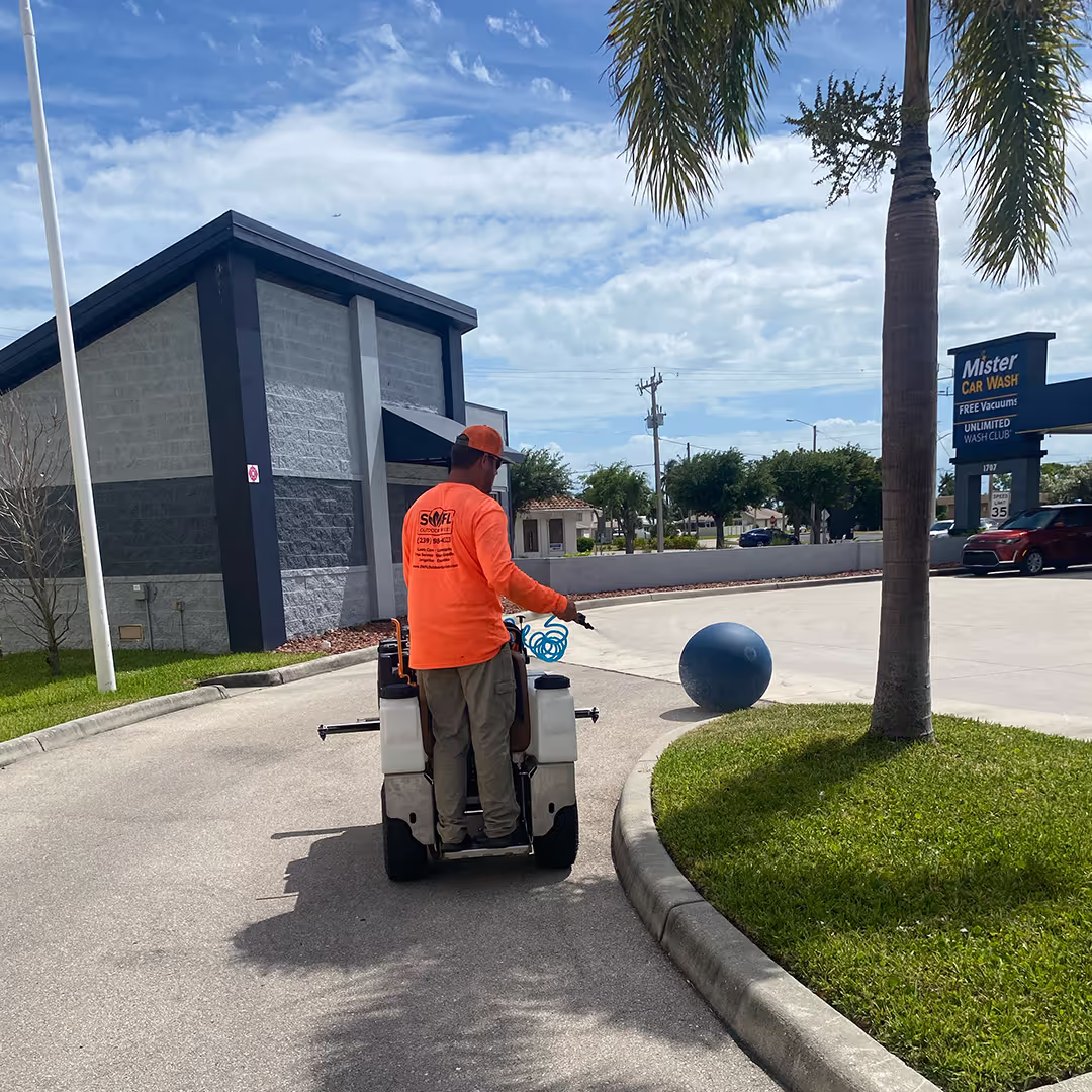 Premier Landscape & Irrigation crew providing professional commercial landscape maintenance in Southwest Florida
