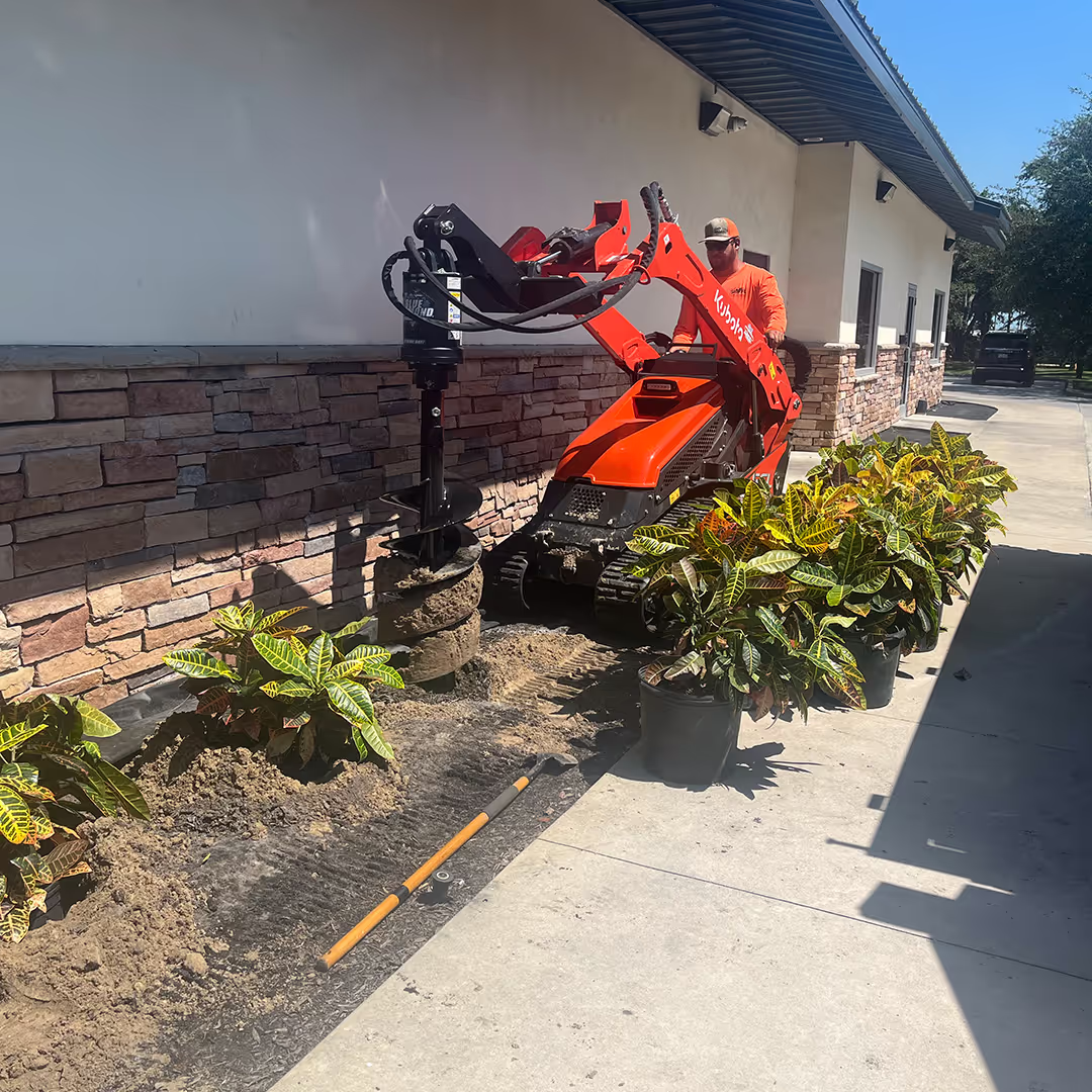 Fresh mulch installation around commercial landscape beds