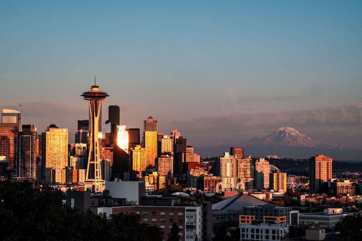 Seattle skyline at sunset with Mount Rainier in the distance