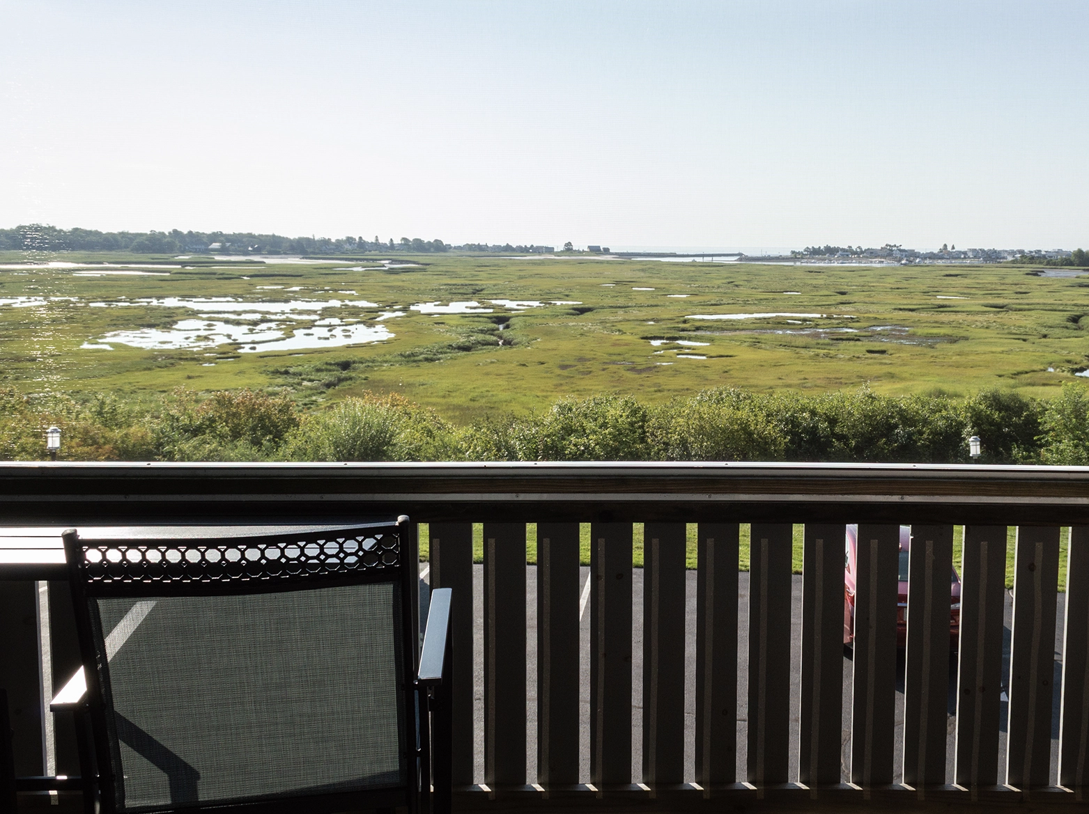 Private balcony with marsh and harbor views