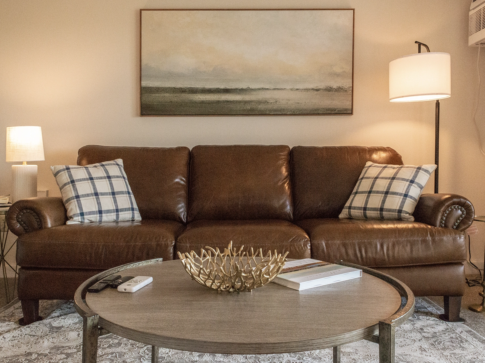 Living room couch at the Salt Marsh Retreat in Wells Maine