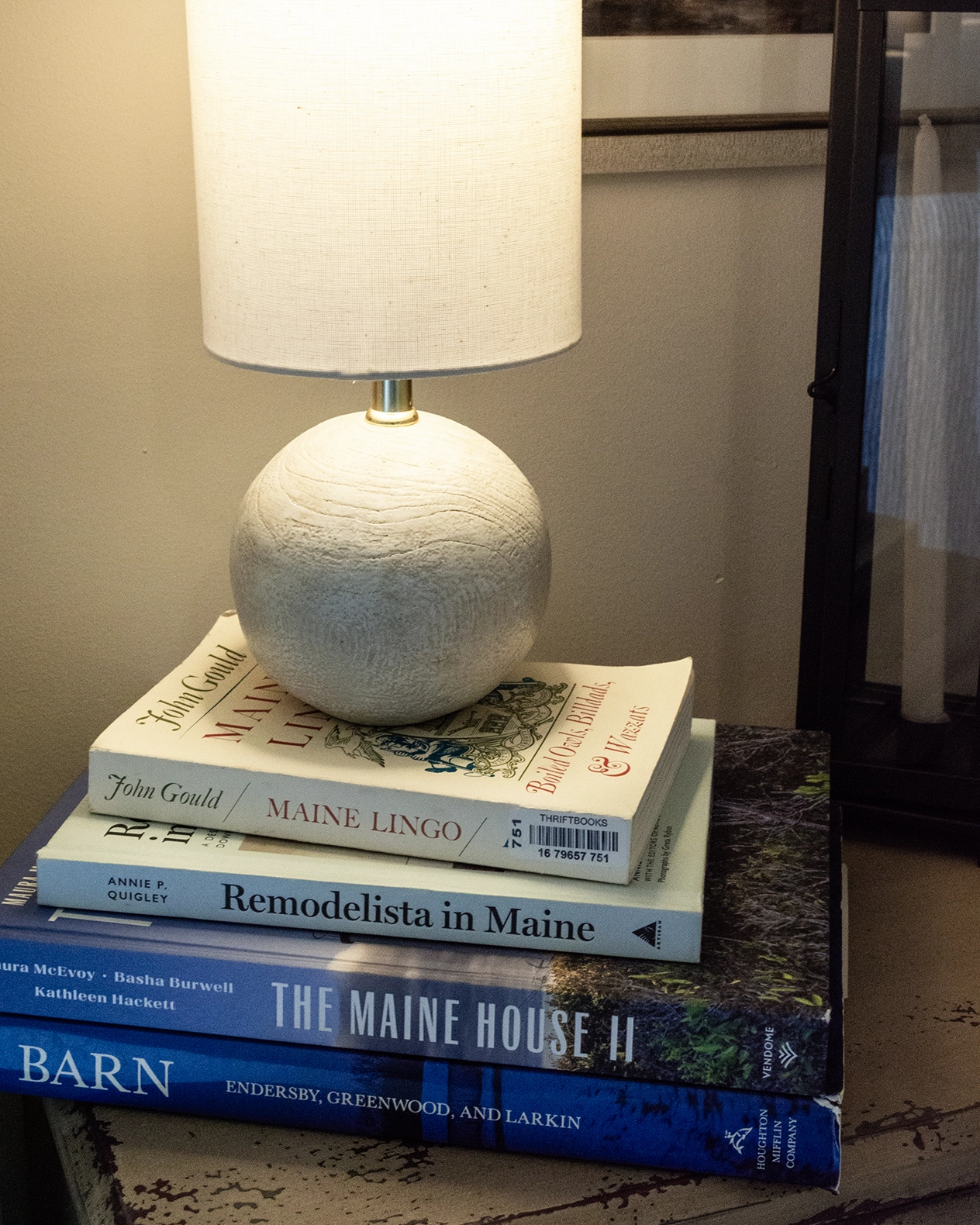 Stack of Maine books at the Salt Marsh Retreat
