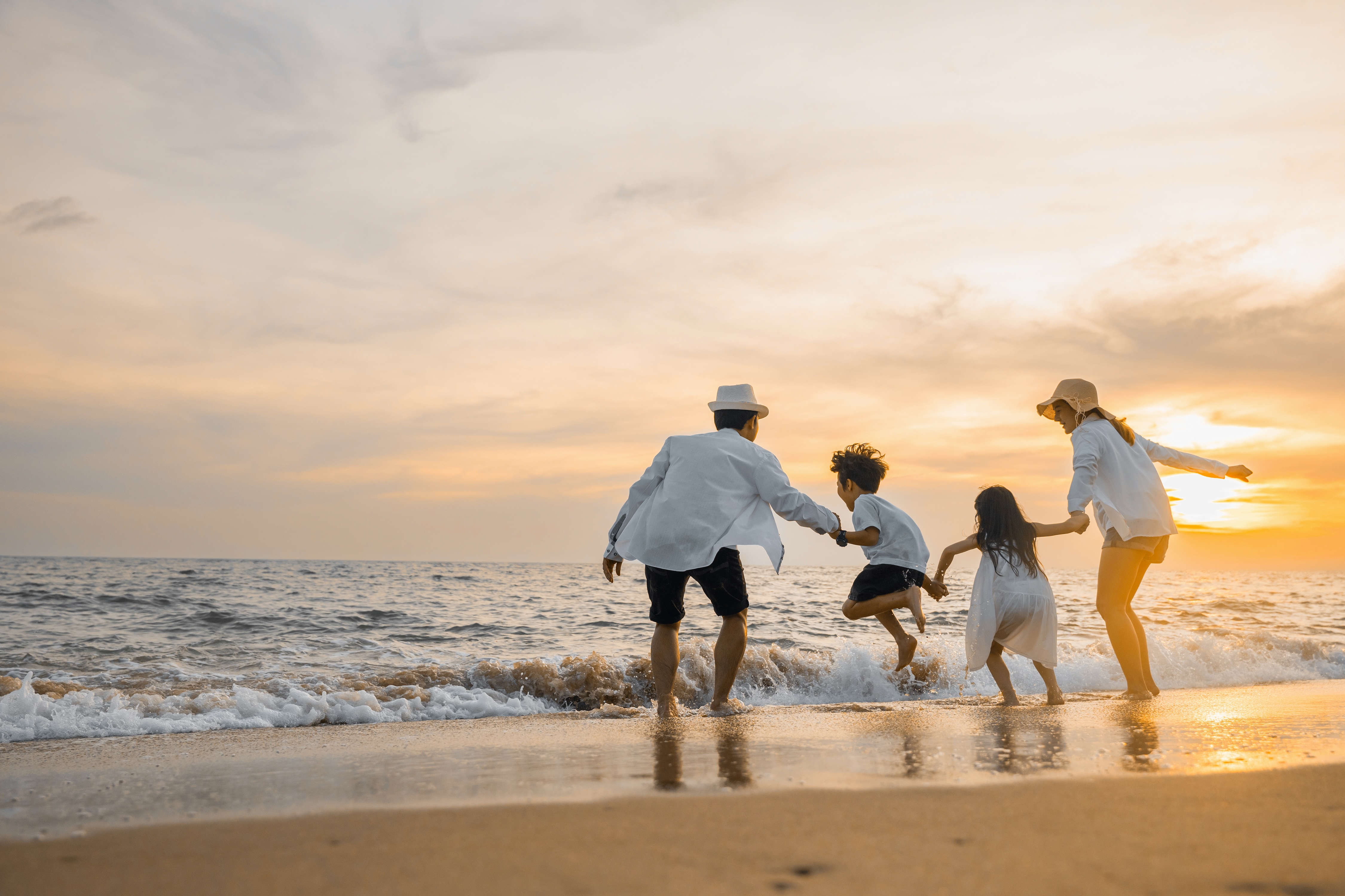 Family at the beach stock image