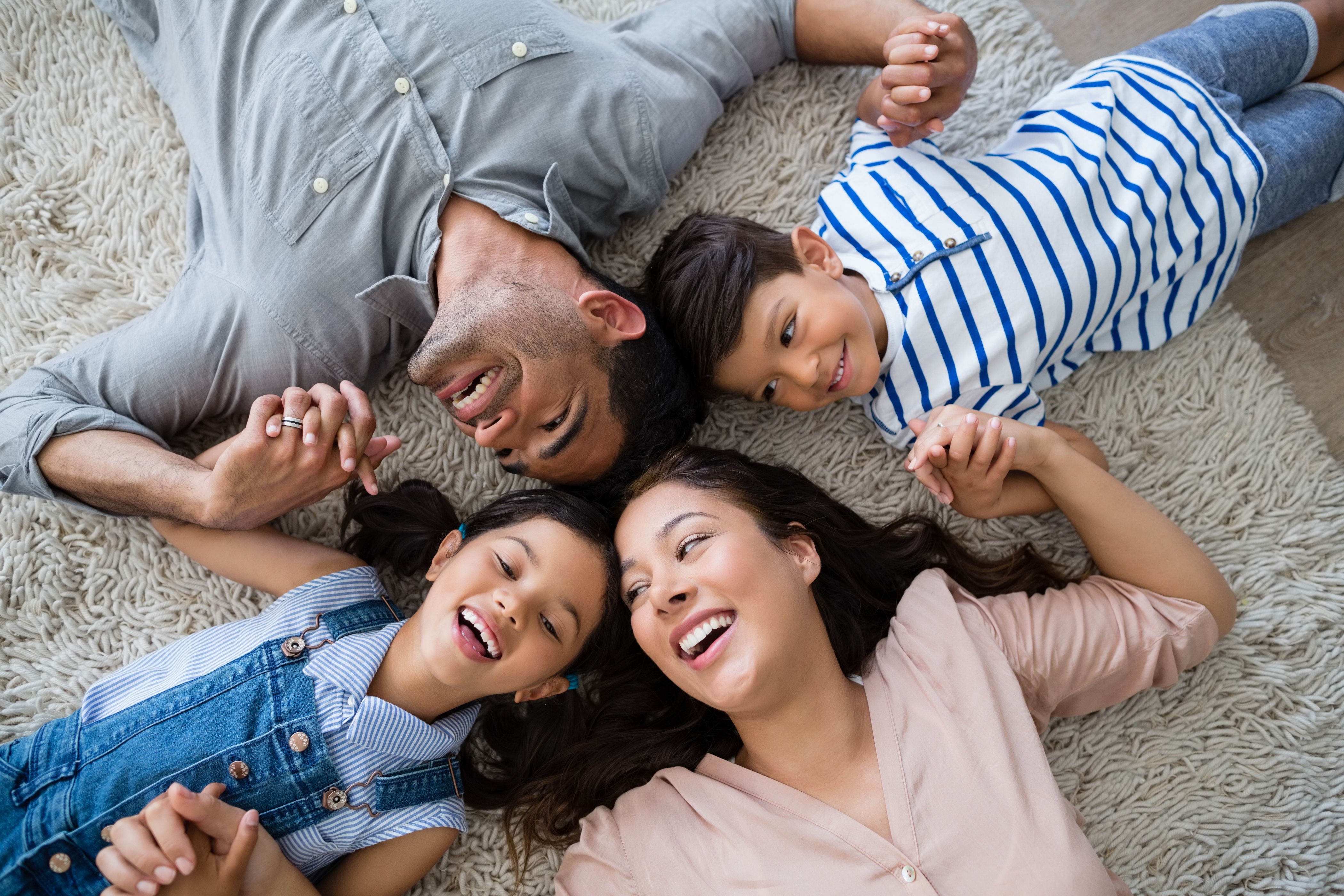 Family laying down stock image
