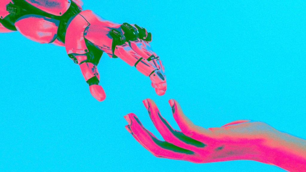A human hand and a robot hand reaching towards each other