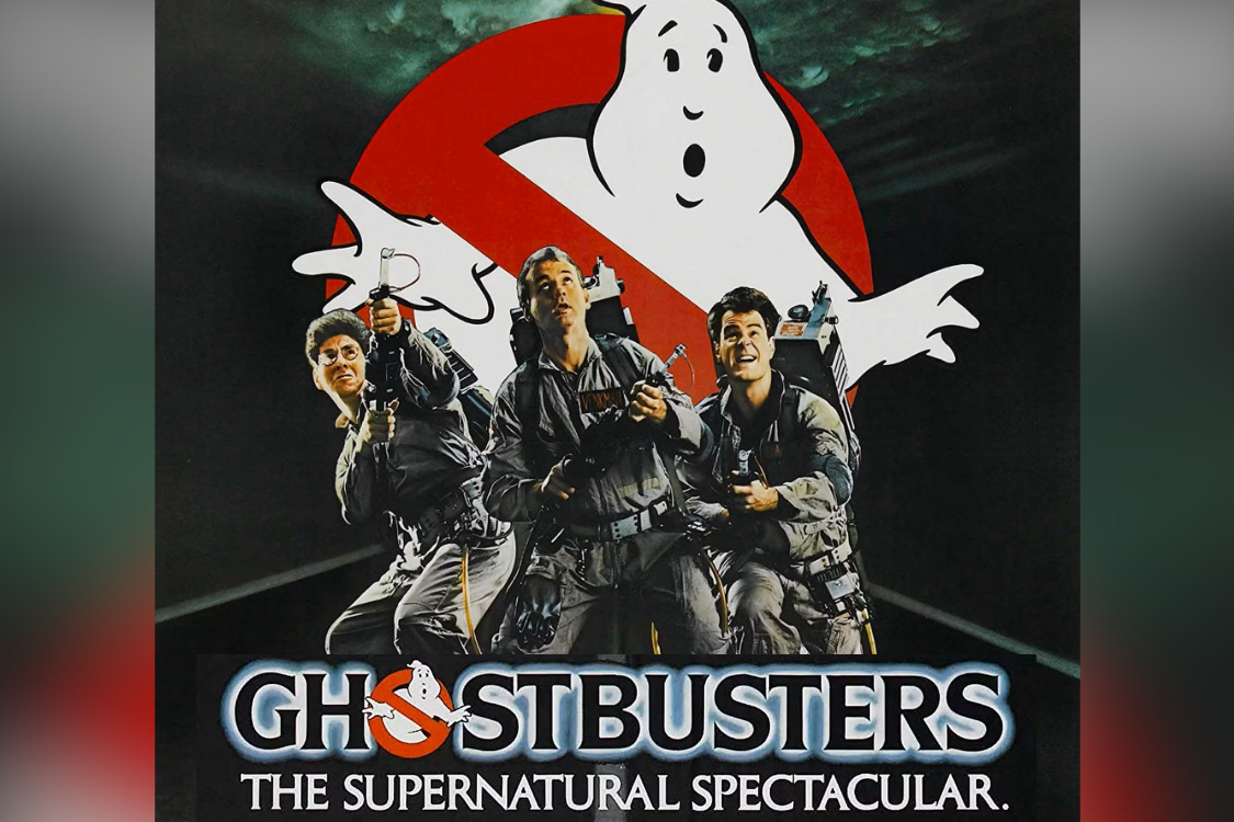 Three characters from Ghostbusters holding up their ghost-fighting machines.