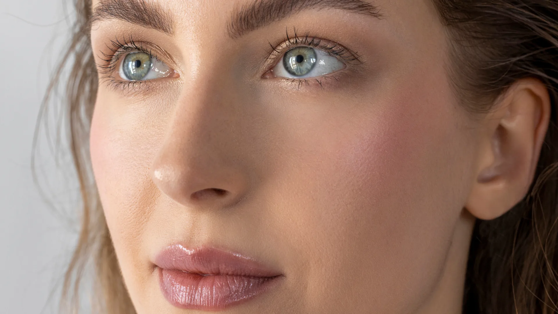 Close-up of a woman's face showing her eyes, nose, and lips