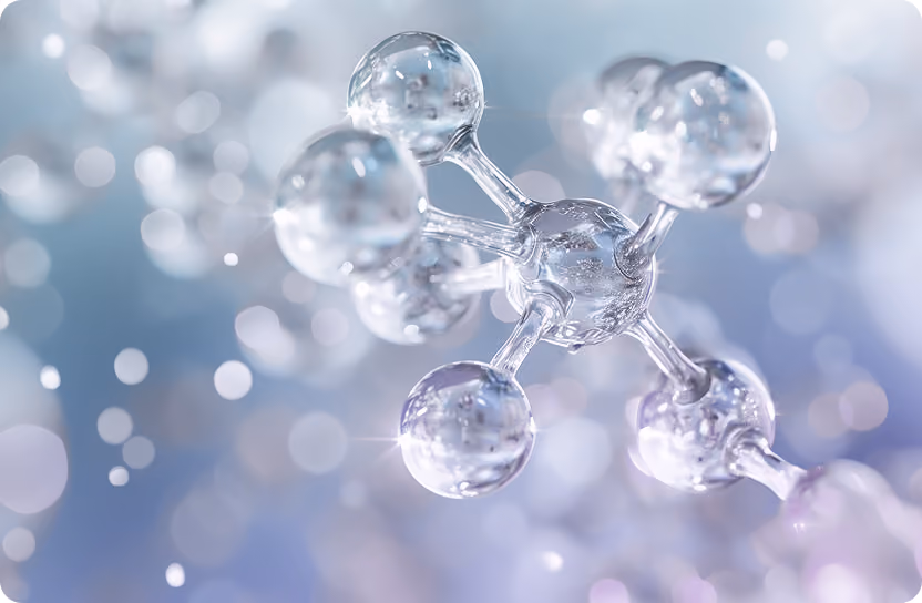 Close-up of a transparent molecular structure with connected spheres against a blurred light background.