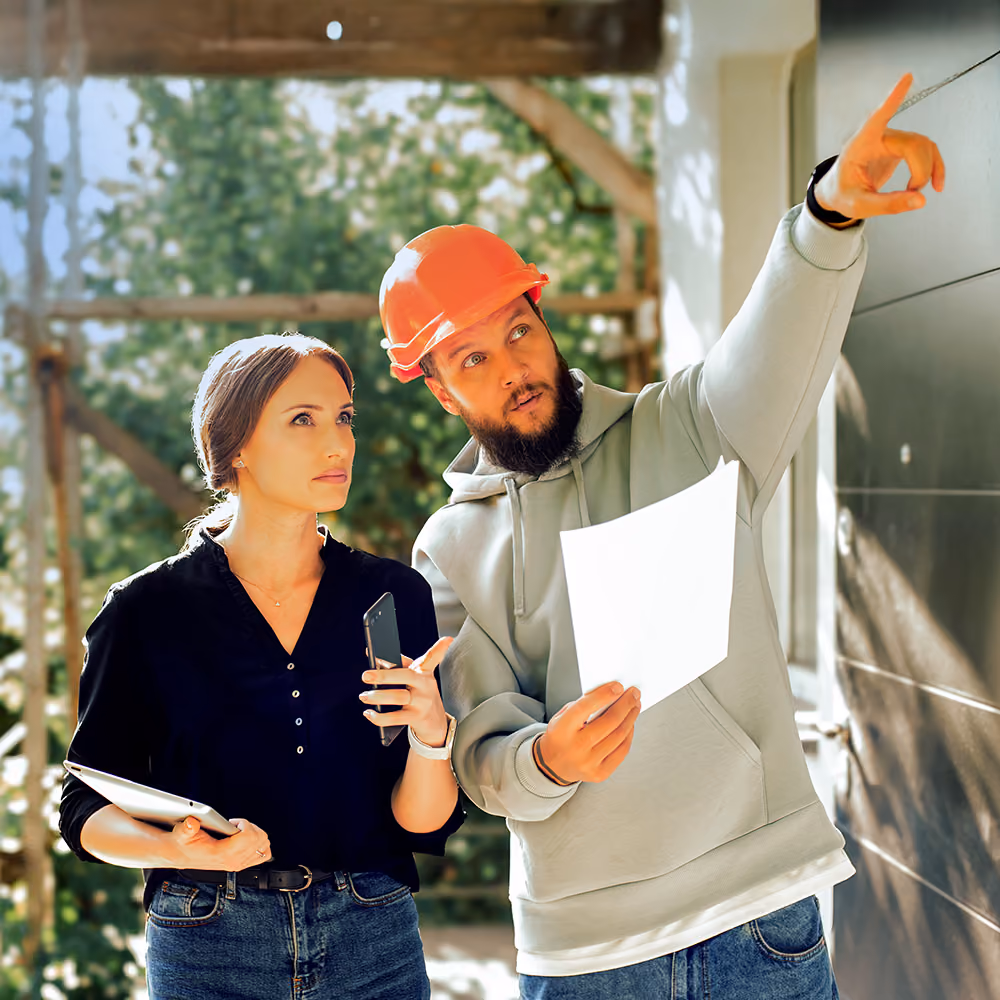 A real estate agent working with a third party contractor.