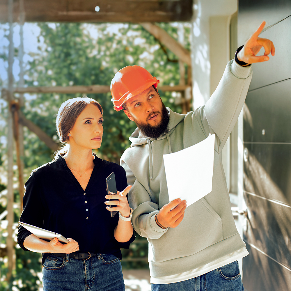 A real estate agent working with a third party contractor.