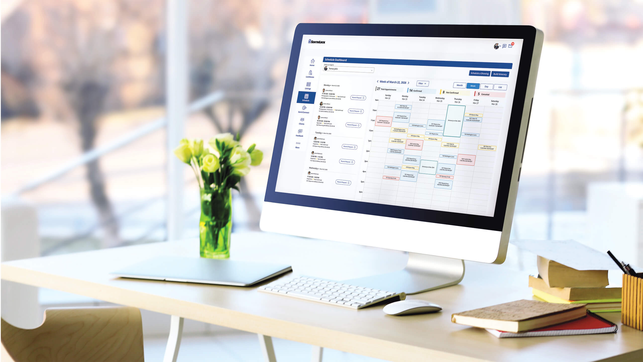 A computer monitor showcasing a real estate agent's weekly itinerary.