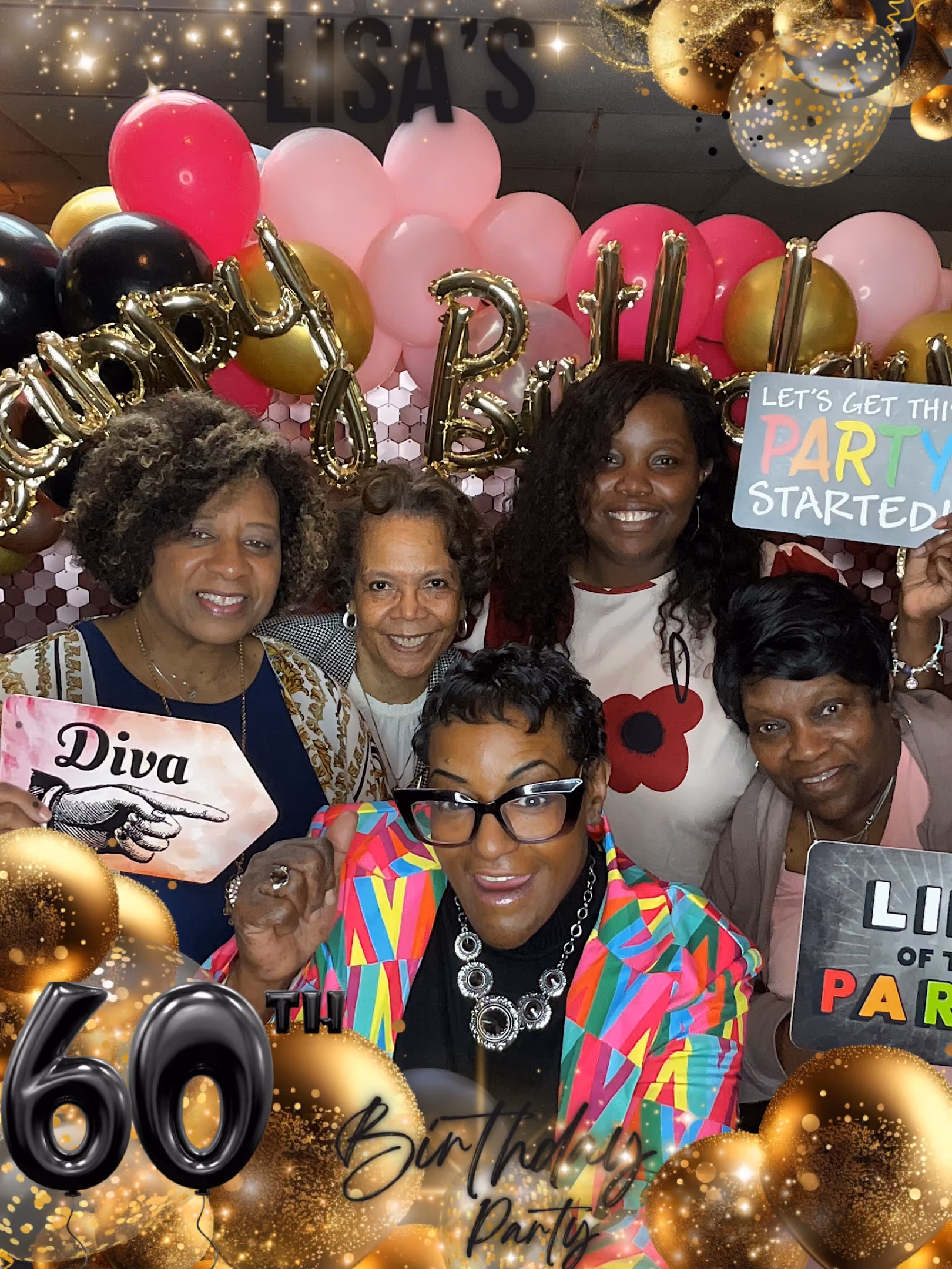 Five women smiling at a 60th birthday party with colorful balloons and celebratory signs.