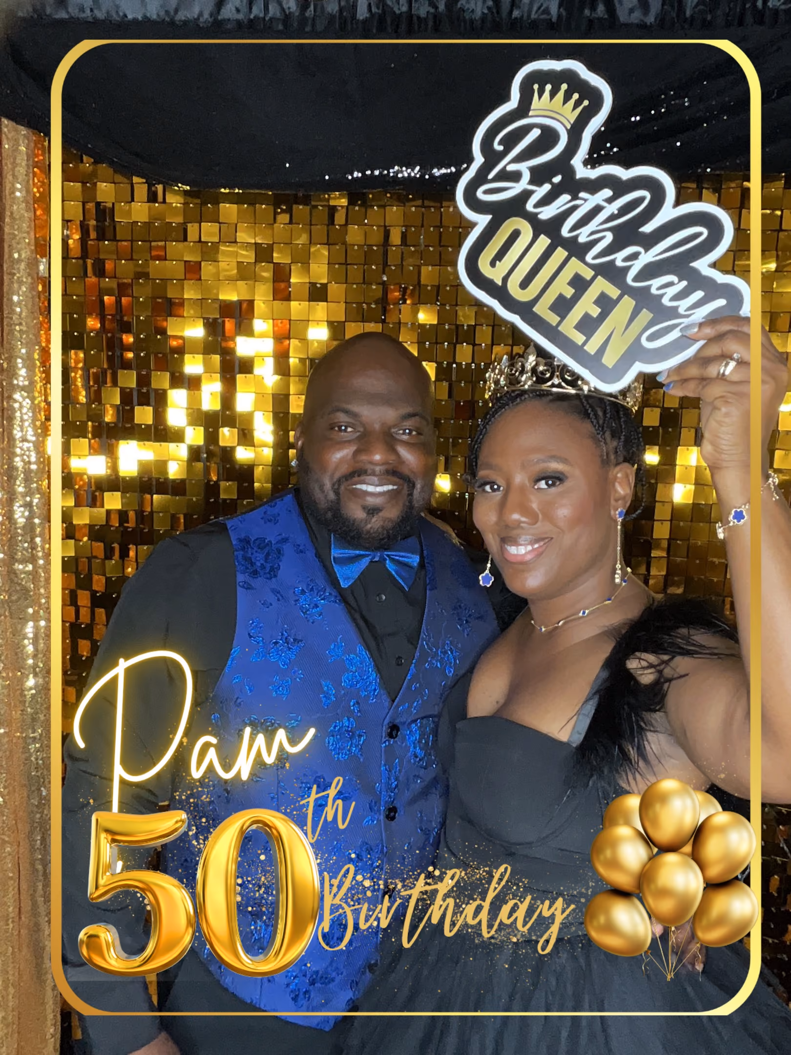 Smiling couple in formal wear posing before gold sequined backdrop for Pam's 50th birthday.