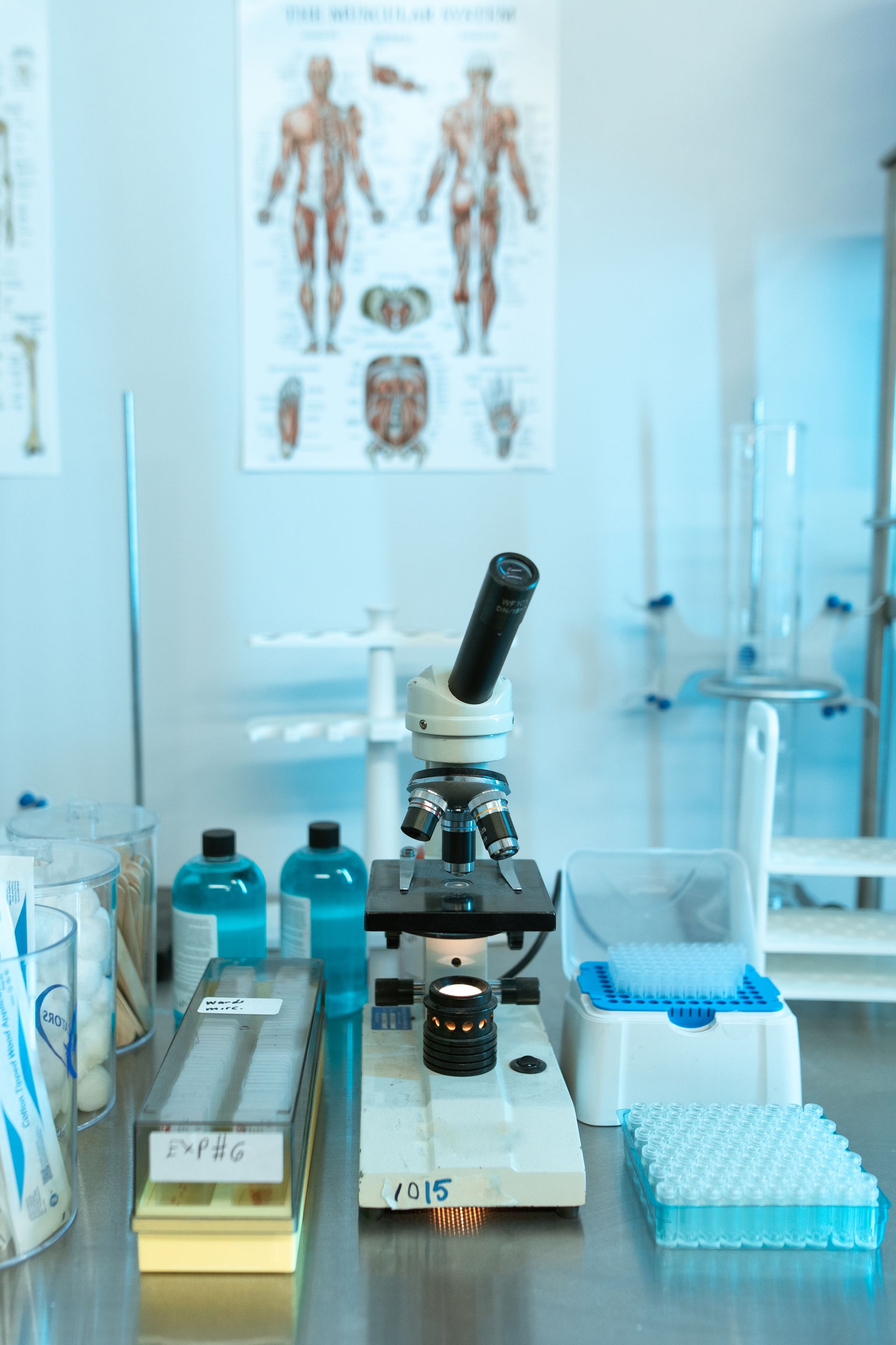picture of microscopy and other scientific equipment on a table in a school science laboratory