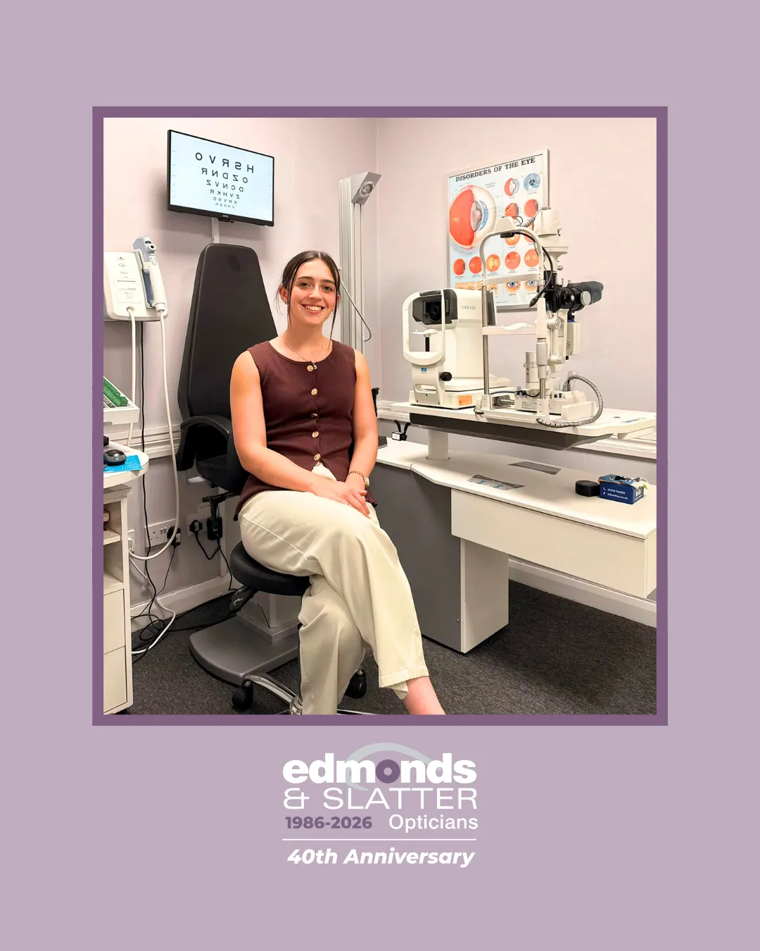 Optometrist seated in an eye examination room, part of Edmonds & Slatter Opticians 40th anniversary
